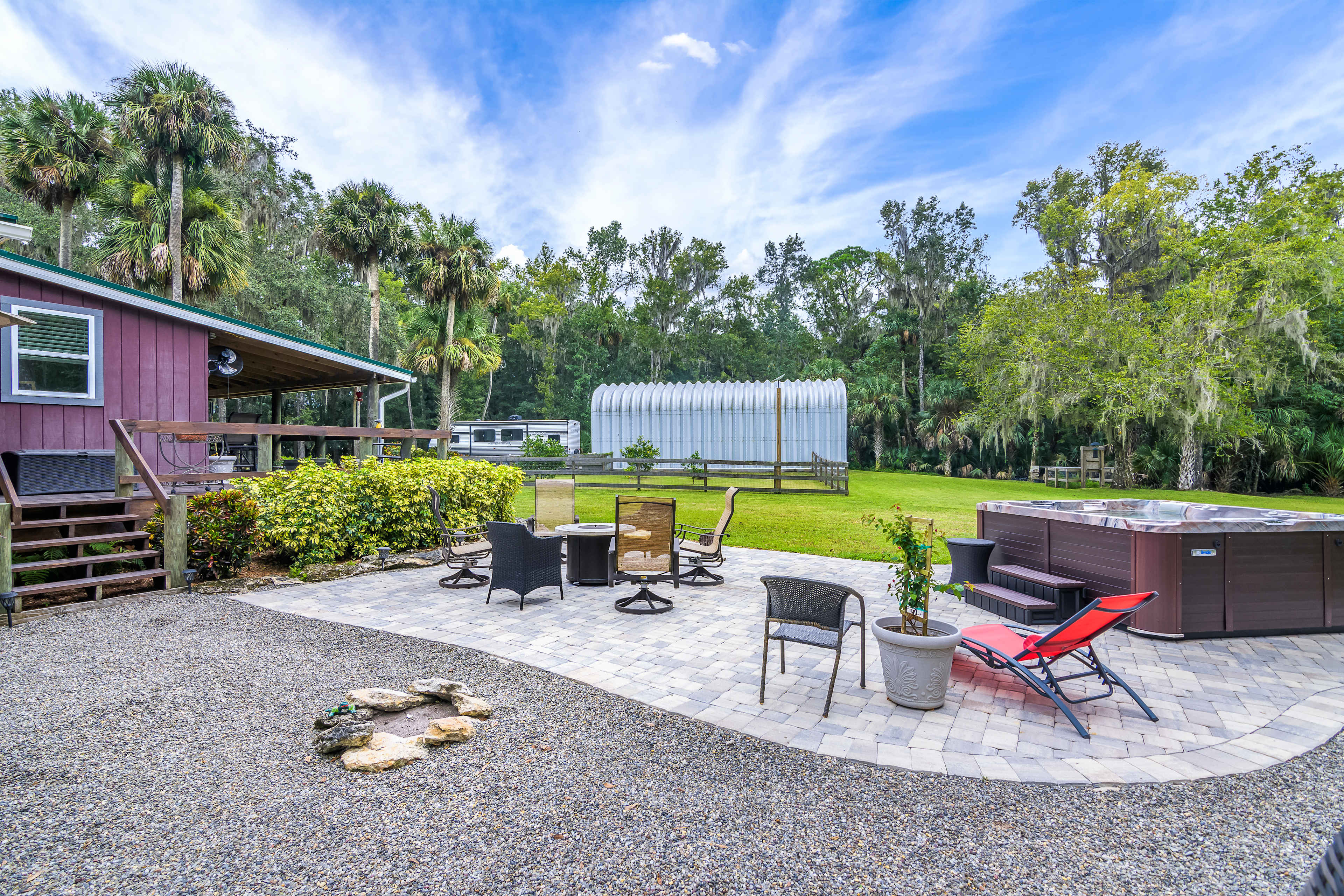 Gas firepit seats 6 adjacent to Lucy's Place