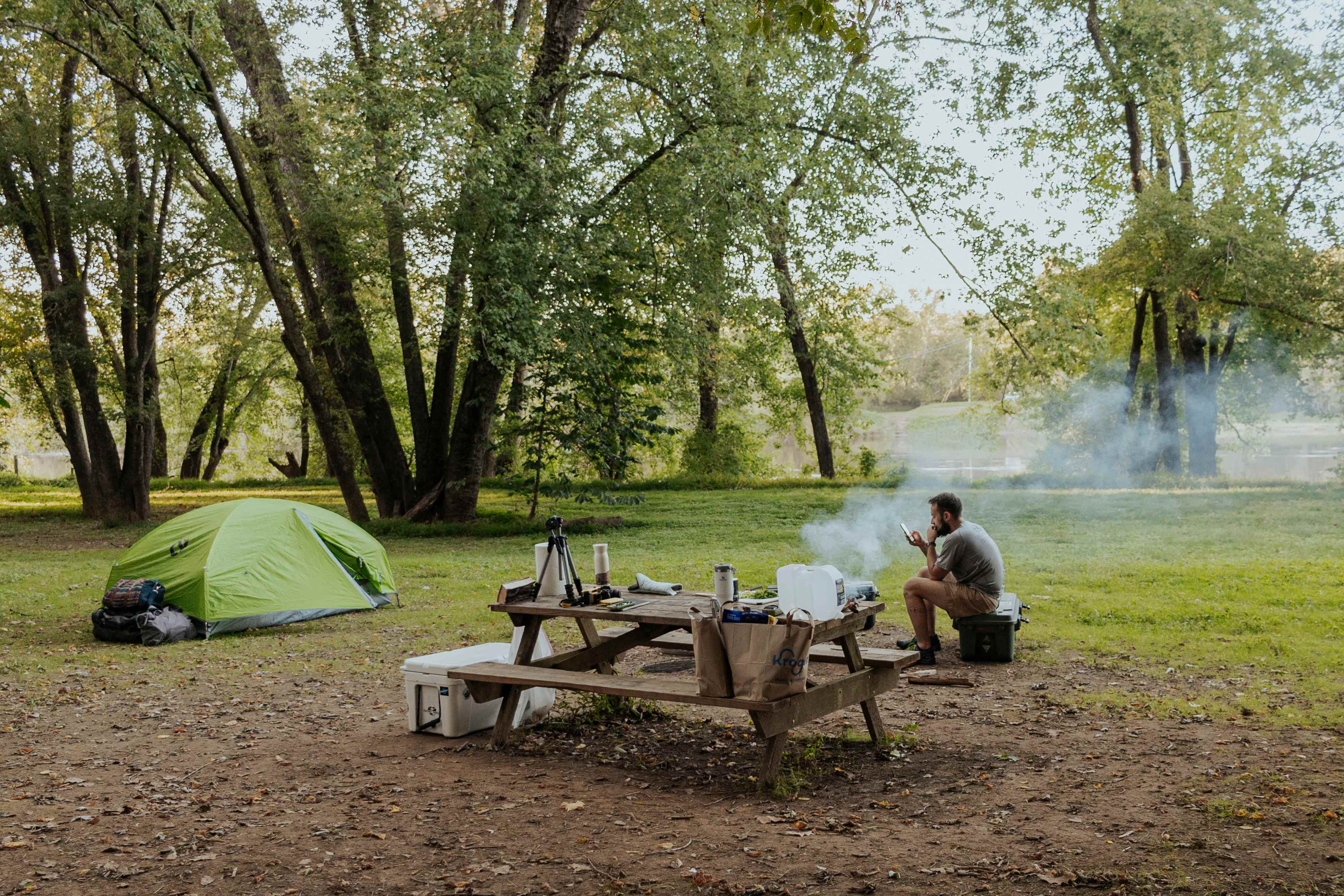 Overview of the campsite with water in the background.