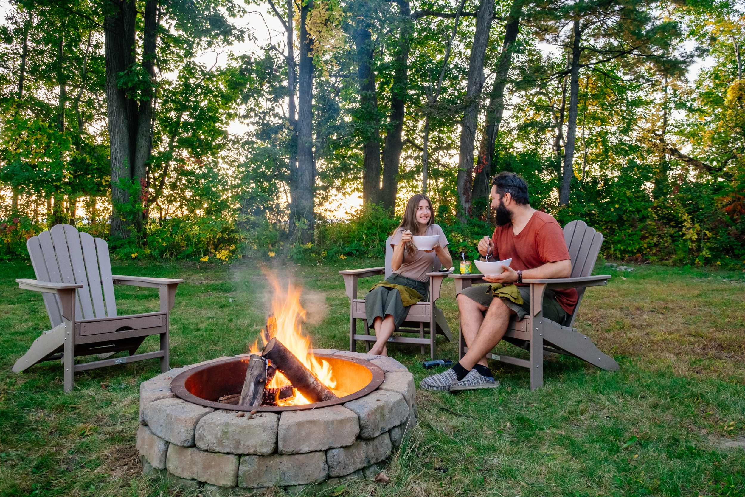 Enjoying dinner by the fire and setting sun