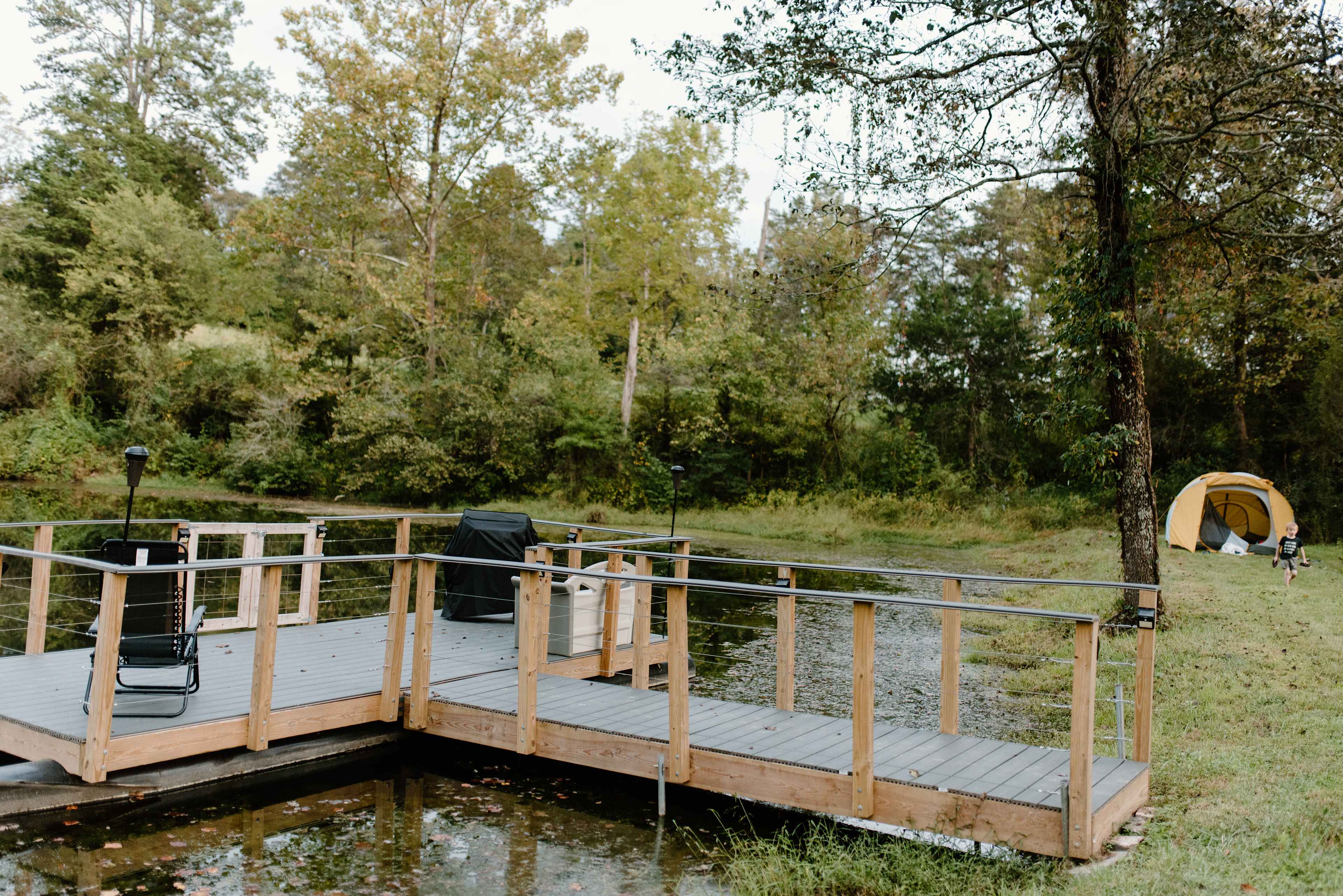 Dock with fish food provided and grill.