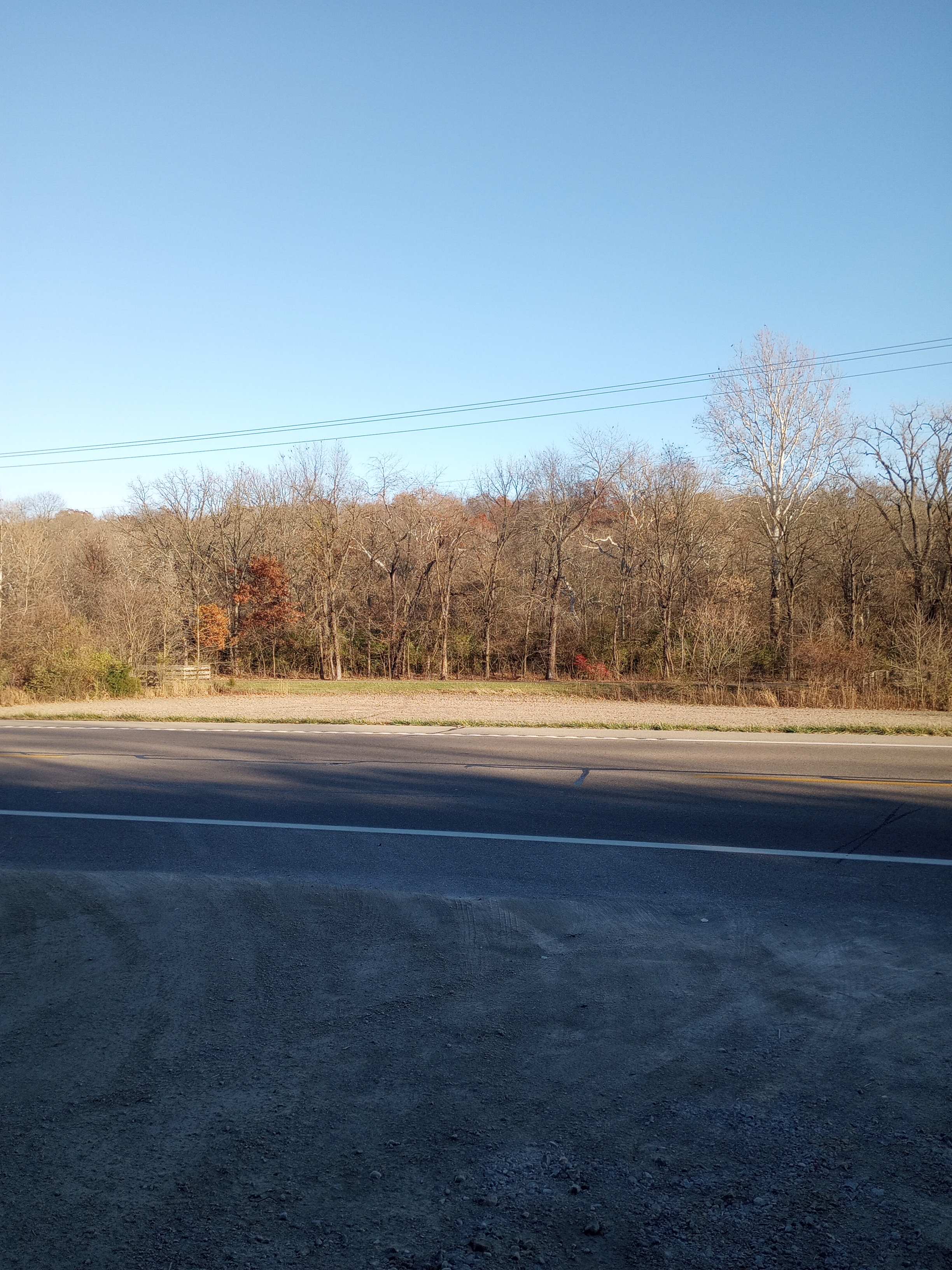 Across the street at the treeline is the Little Miami Scenic Trail.  I don't know if you can access it though.  Right across the street is a steep slope.