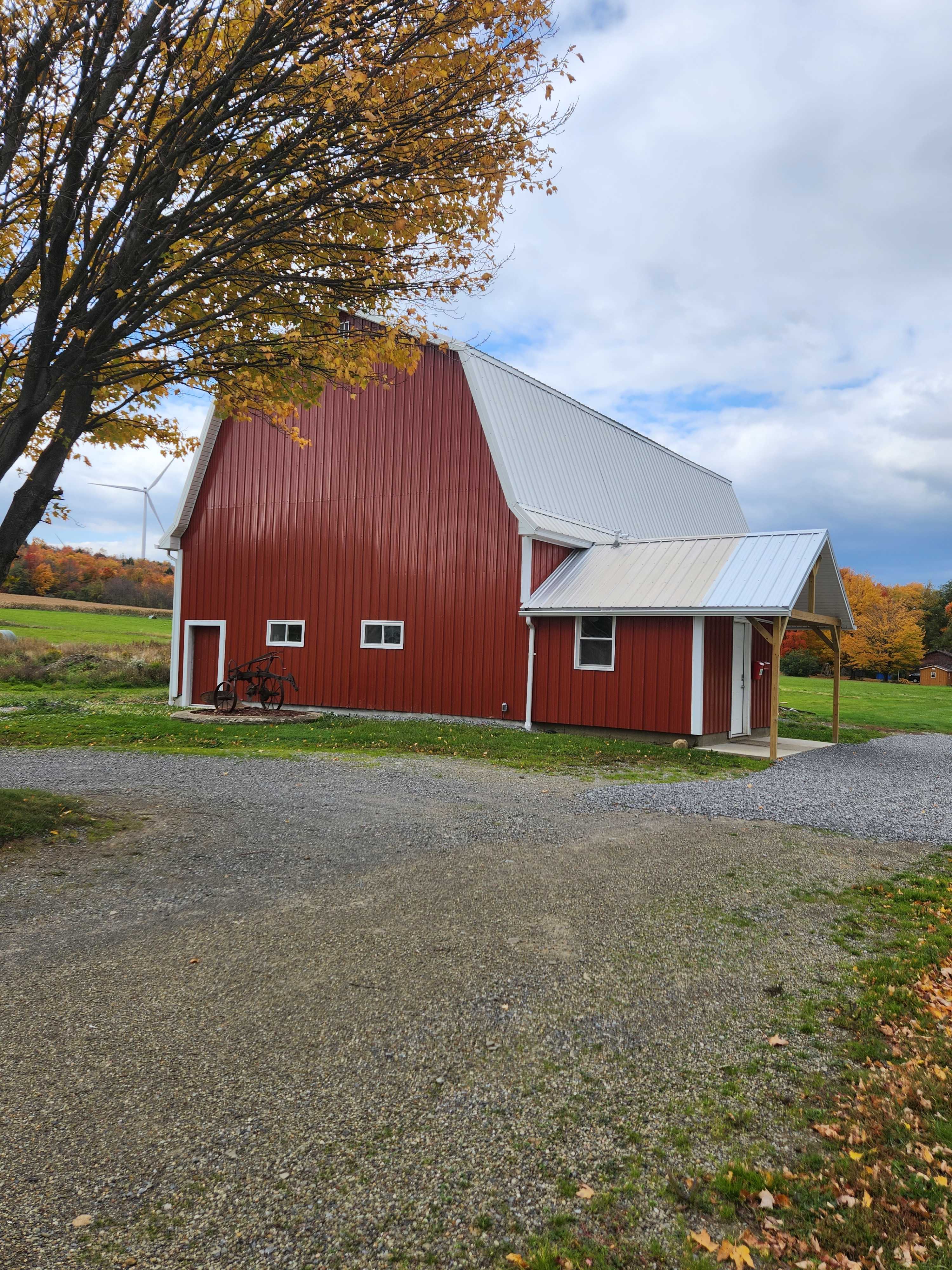 A covered entrance with ample parking awaits your arrival