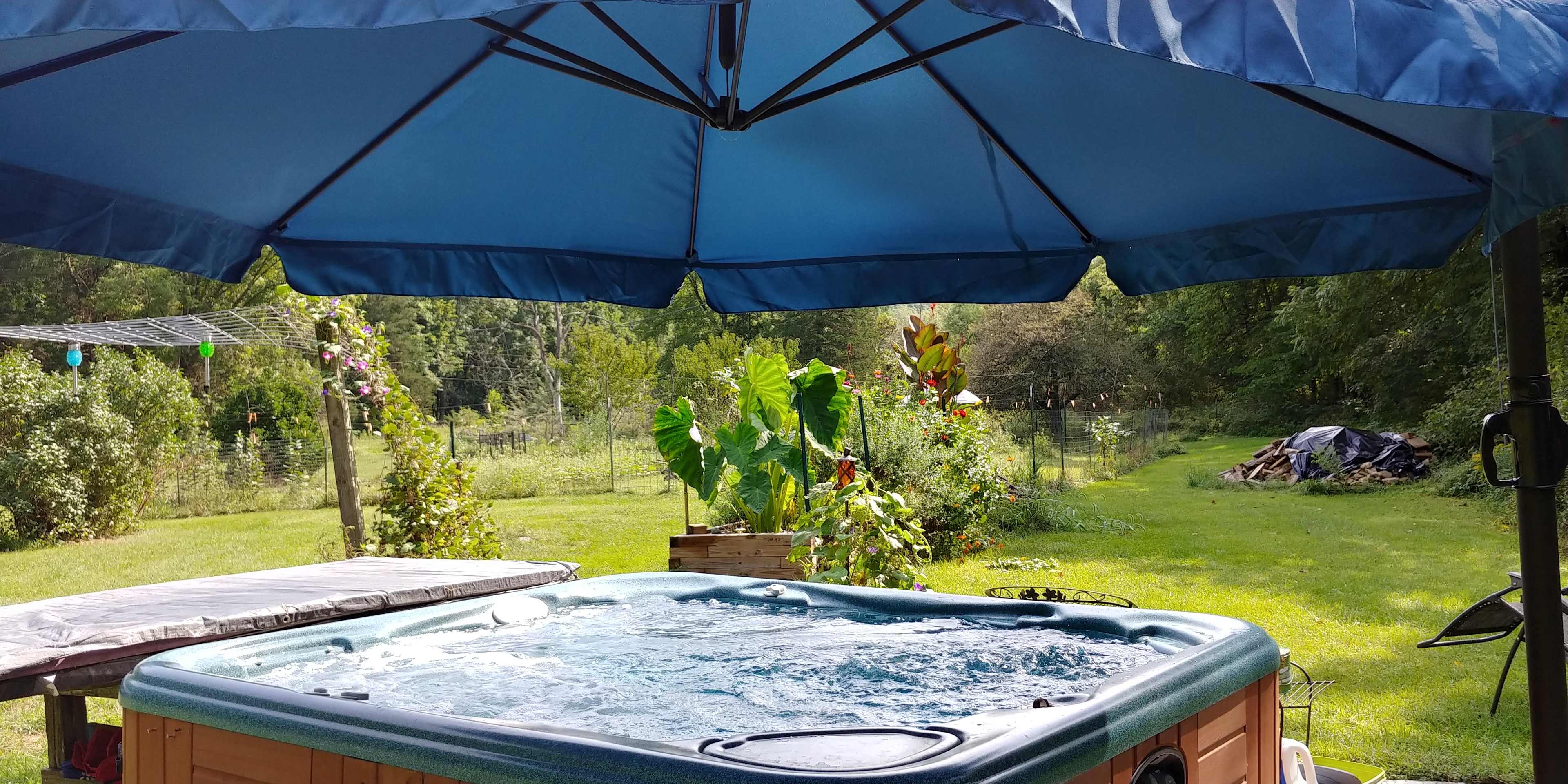 Hot tub isn’t directly next to the cabin.