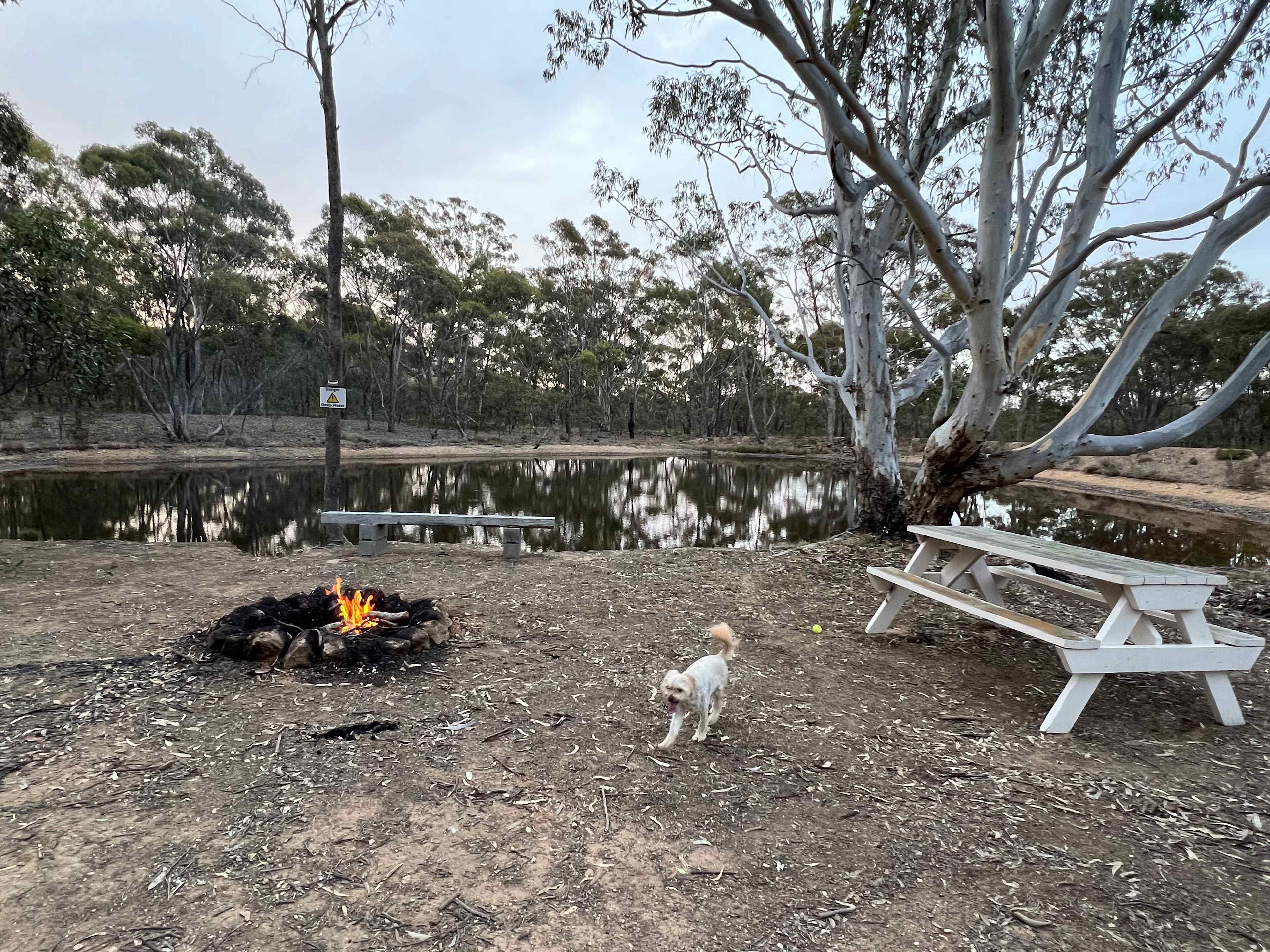 Enjoy the serenity with a sizeable camp fire area, a table bench for family dining.
