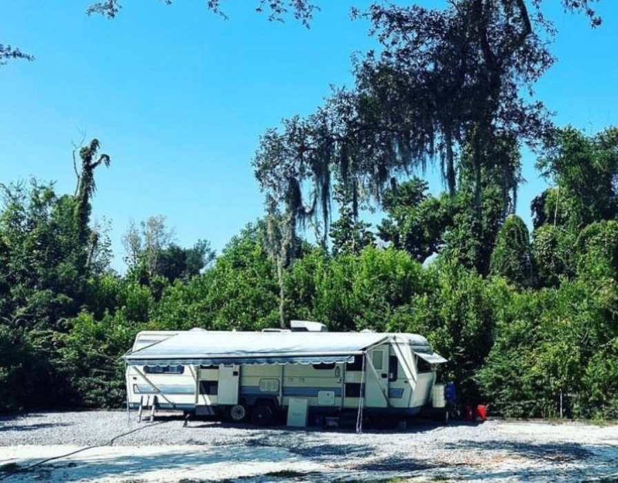 SITE 2 -has gravel parking area and utilizes the 30Amp hookup as well as water (Shared with site 1 via a "Y" adapter