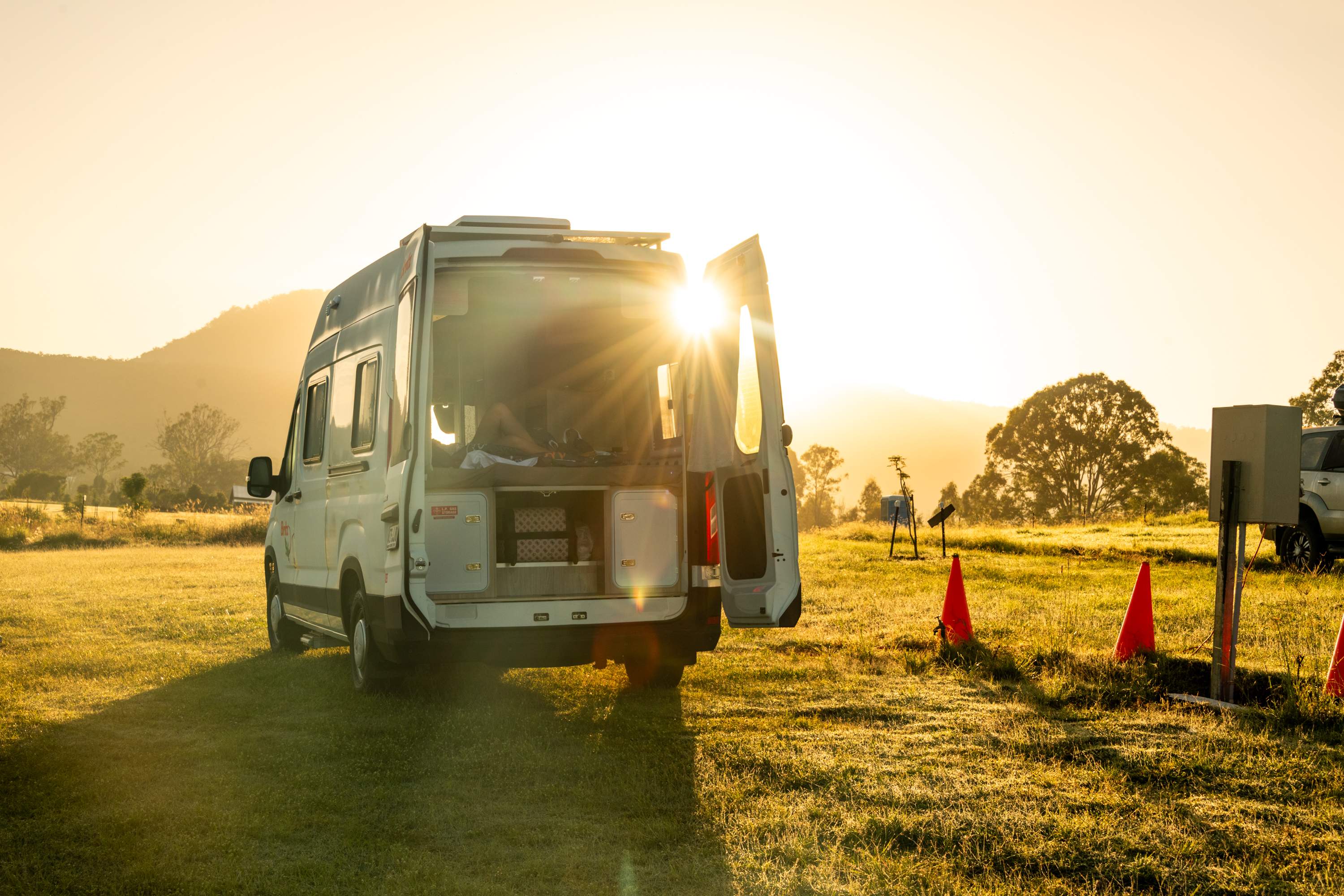 Relaxing in our van at sunset