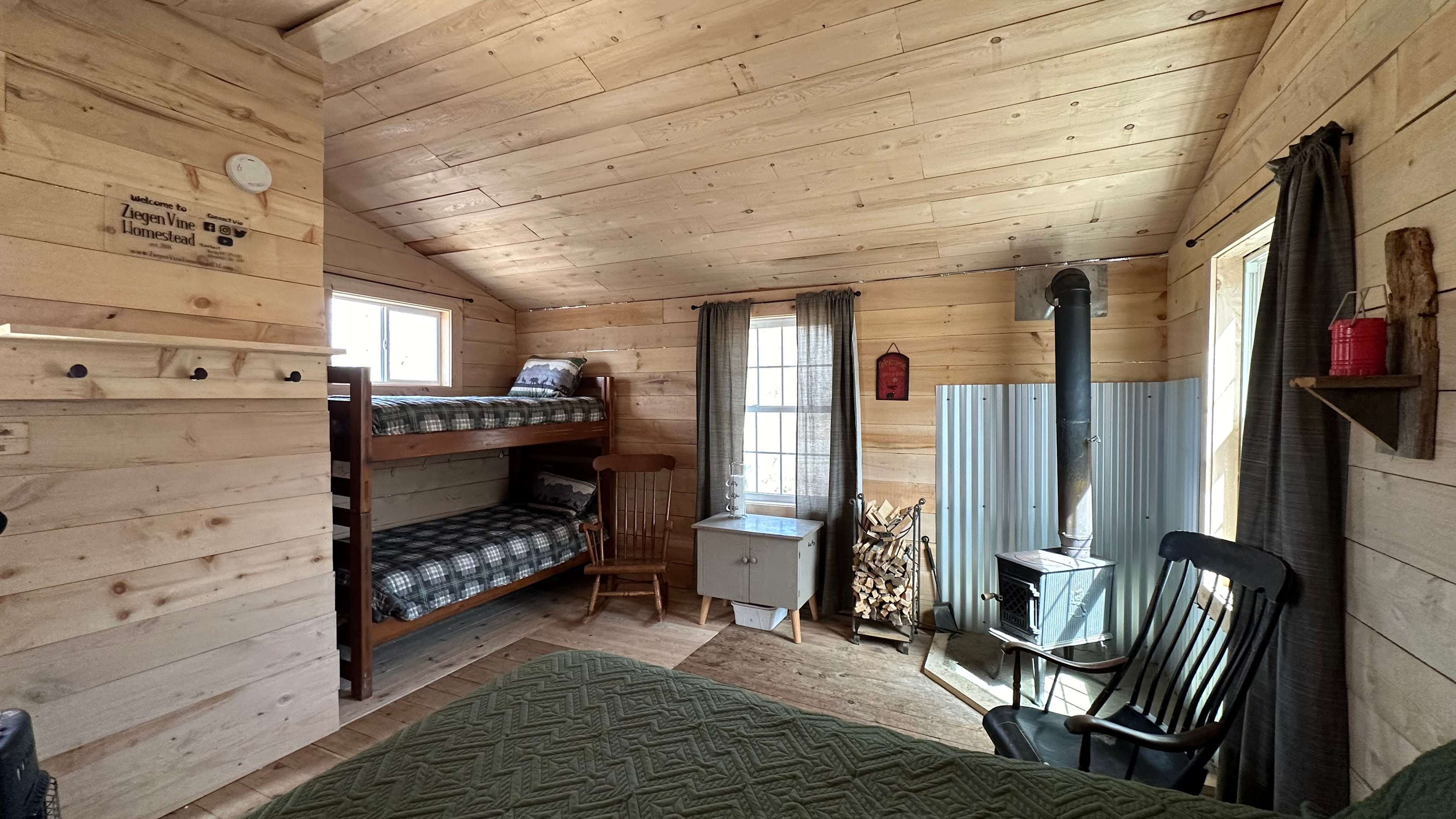 New for 2024!  The cabin in the woods has been resided, insulated, new roof, twin bunk beds, new door and new windows!  