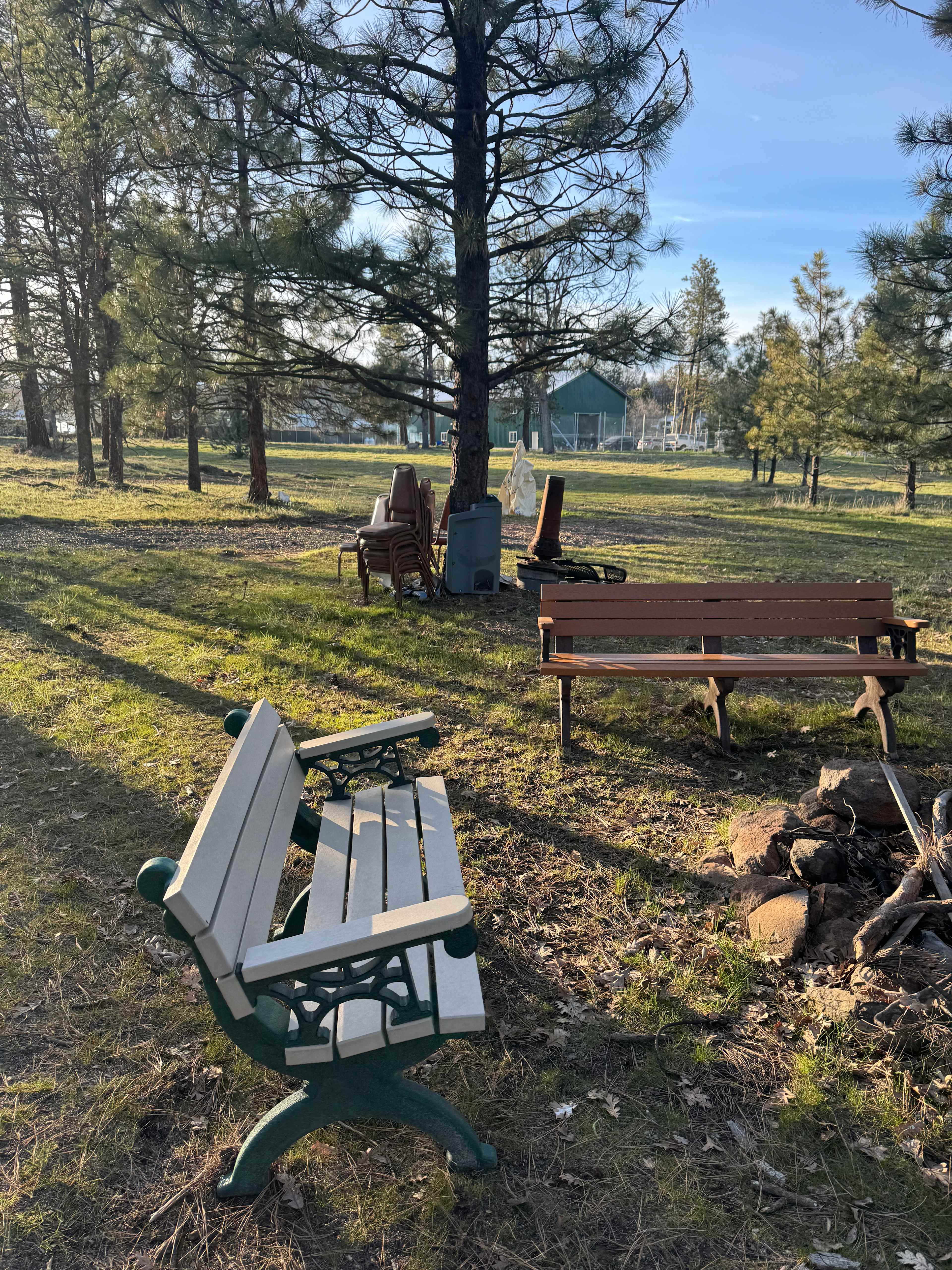 Fire pit with benches .  We also added a log surround to the fire pit area.
