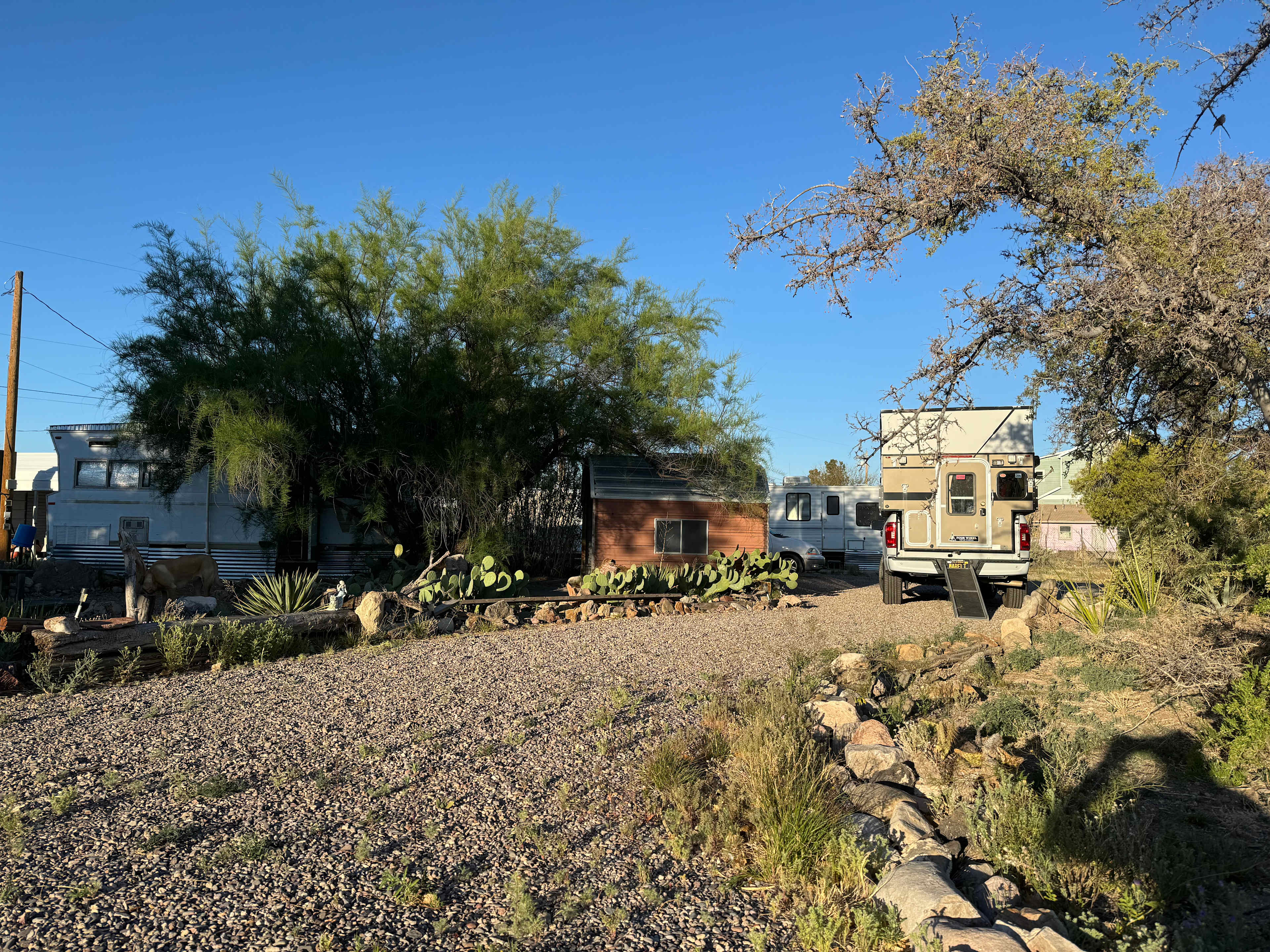 The tiny home and parking area