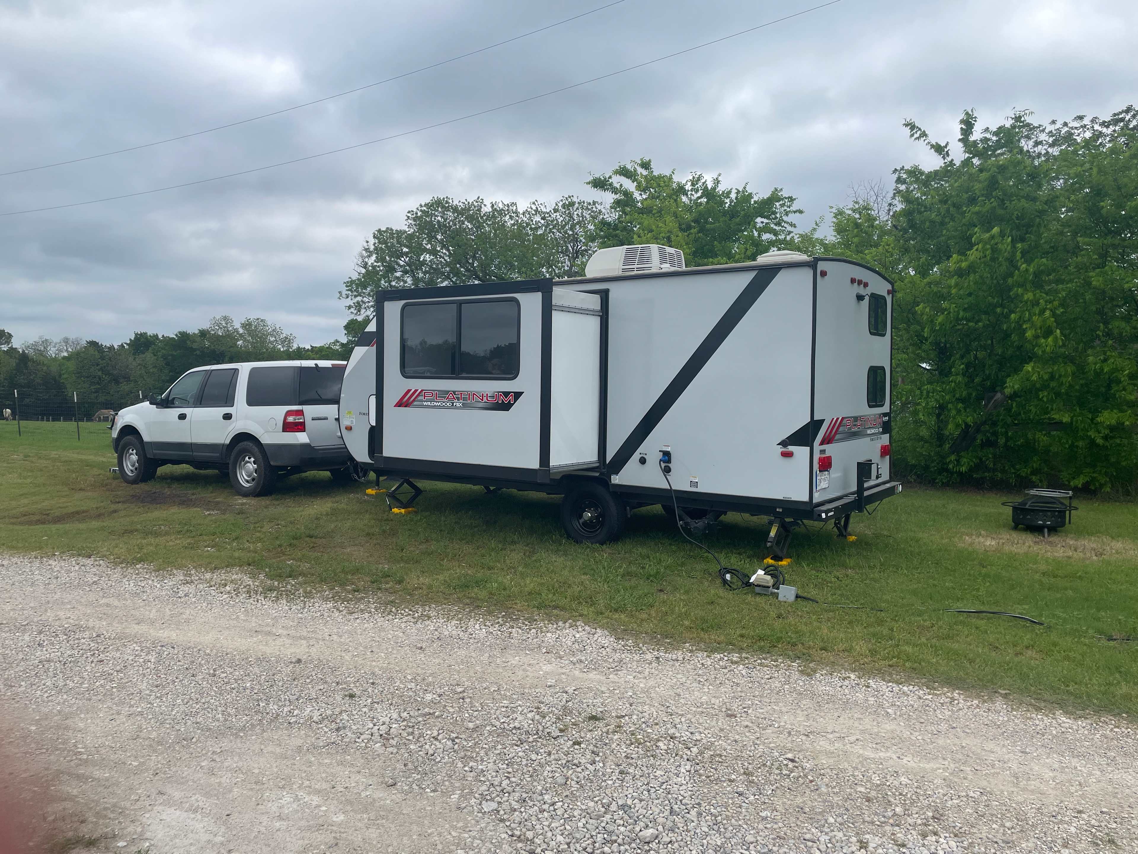 Easy pull in! Electrical connections and fire pit/grill too