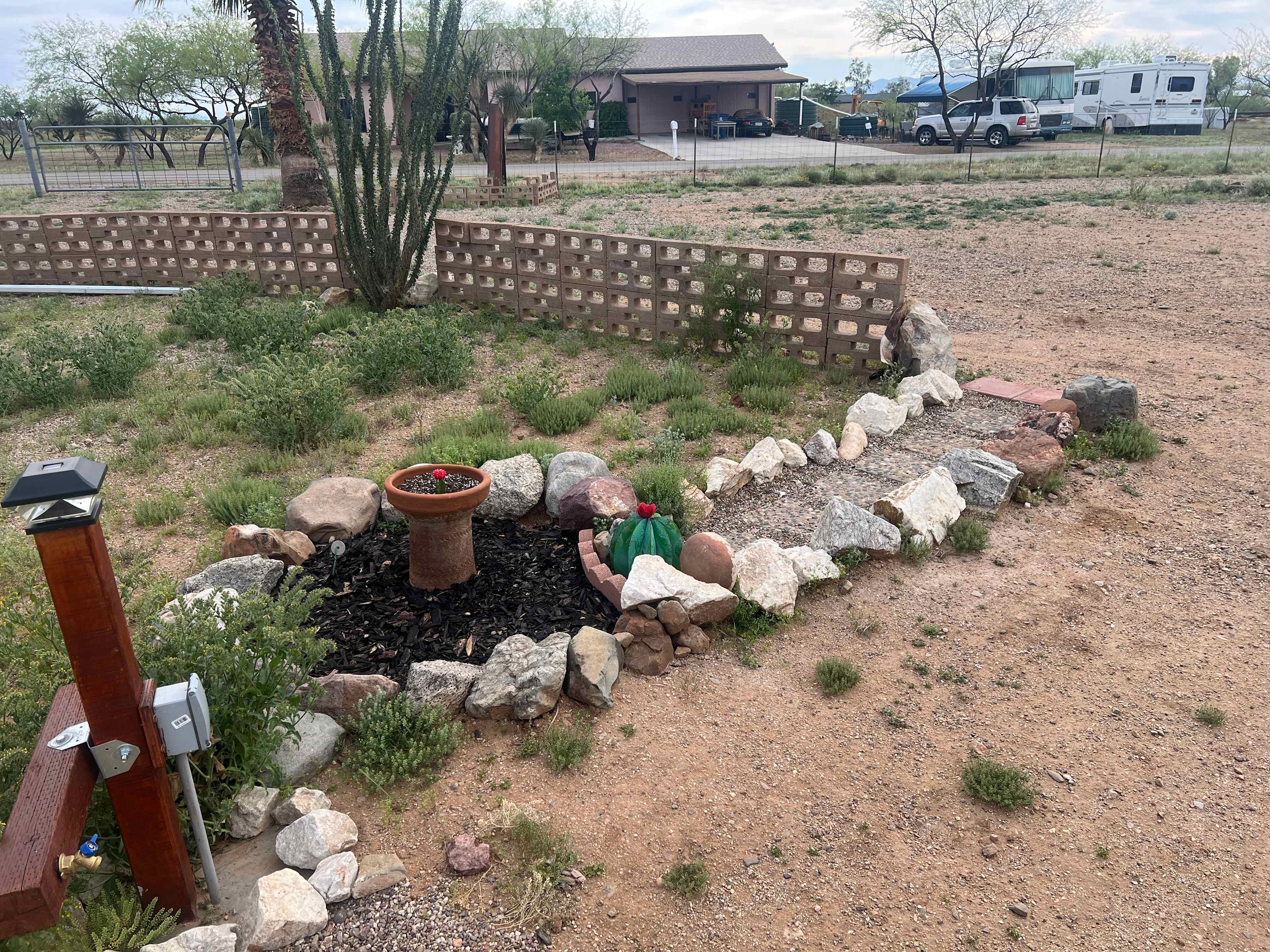 Dump station access is under the metal cactus.