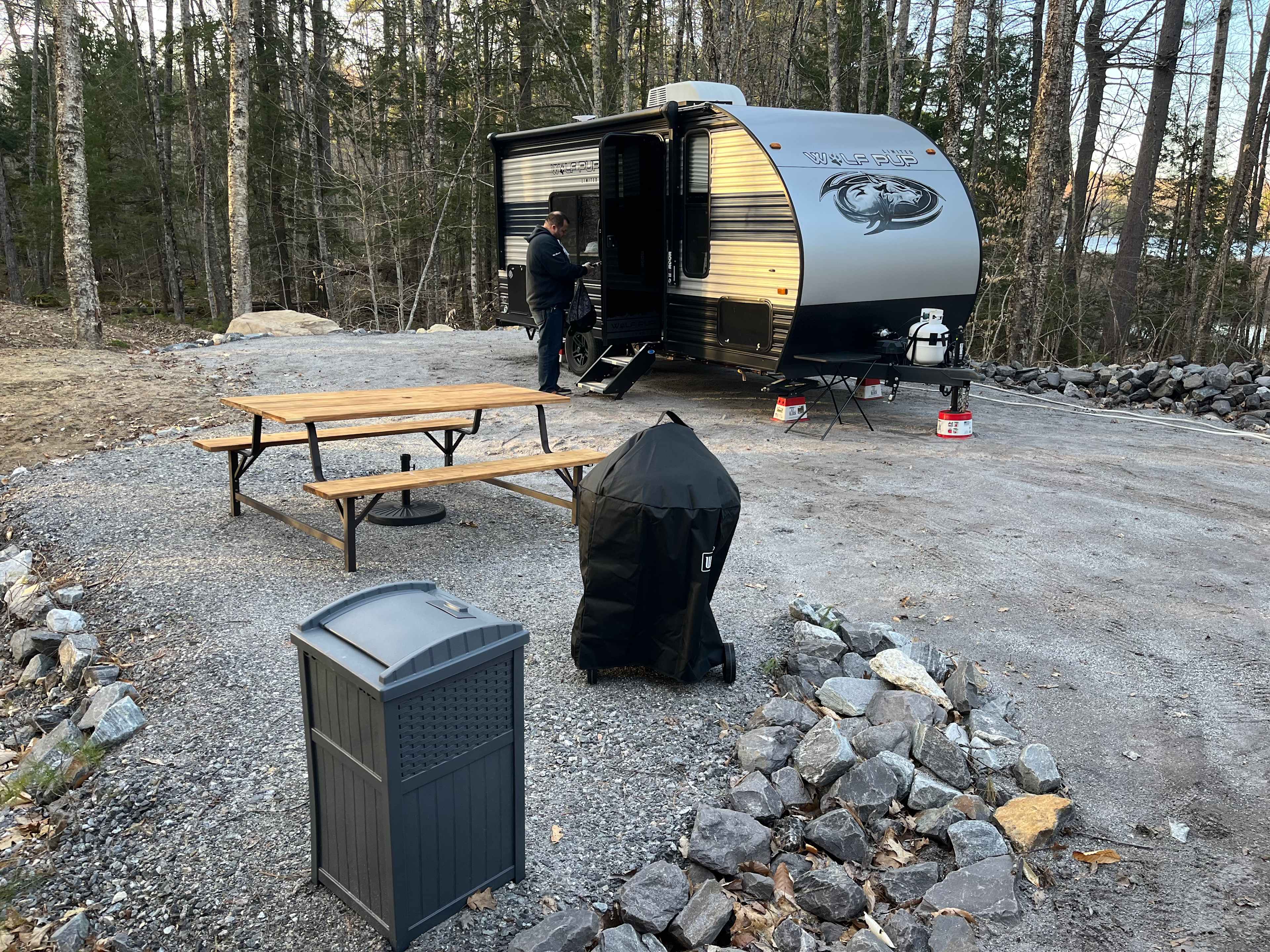 The picnic table and grill
