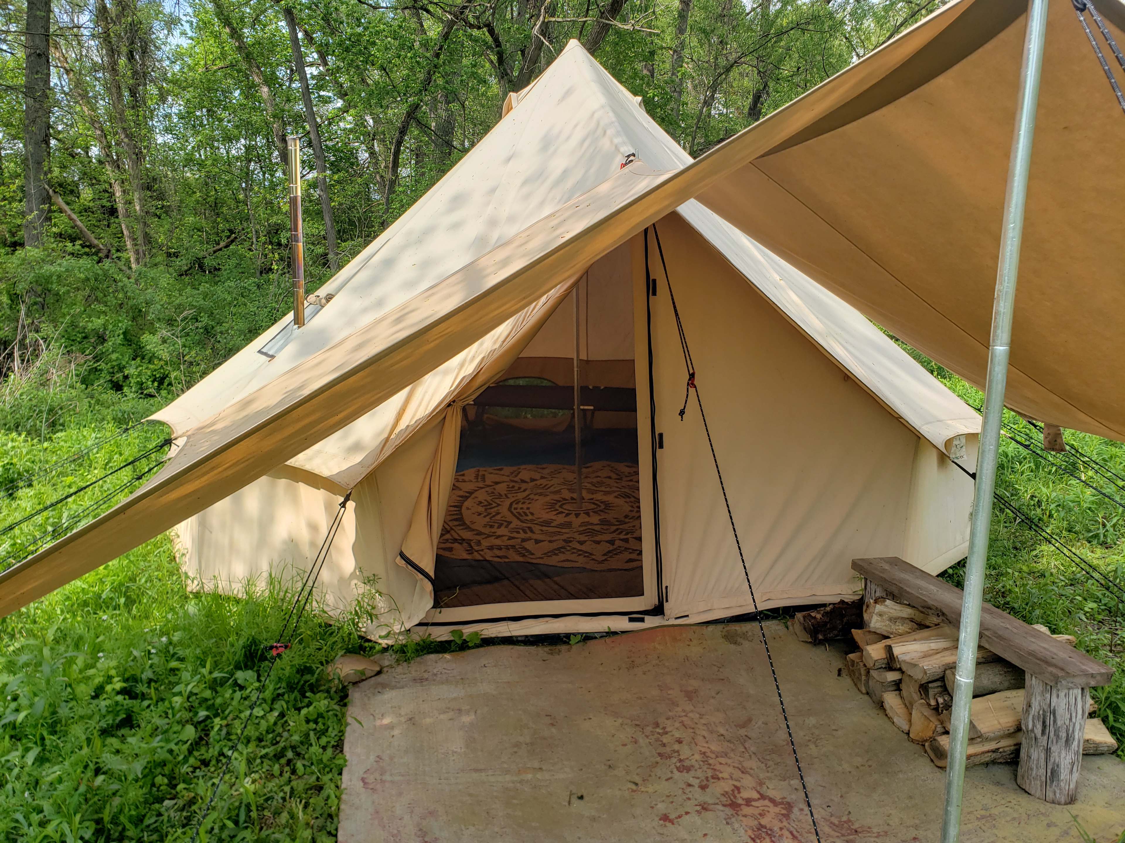 The large canopy adds space to stay under cover, keeps the entryway dry, and is a great spot to remove your shoes.