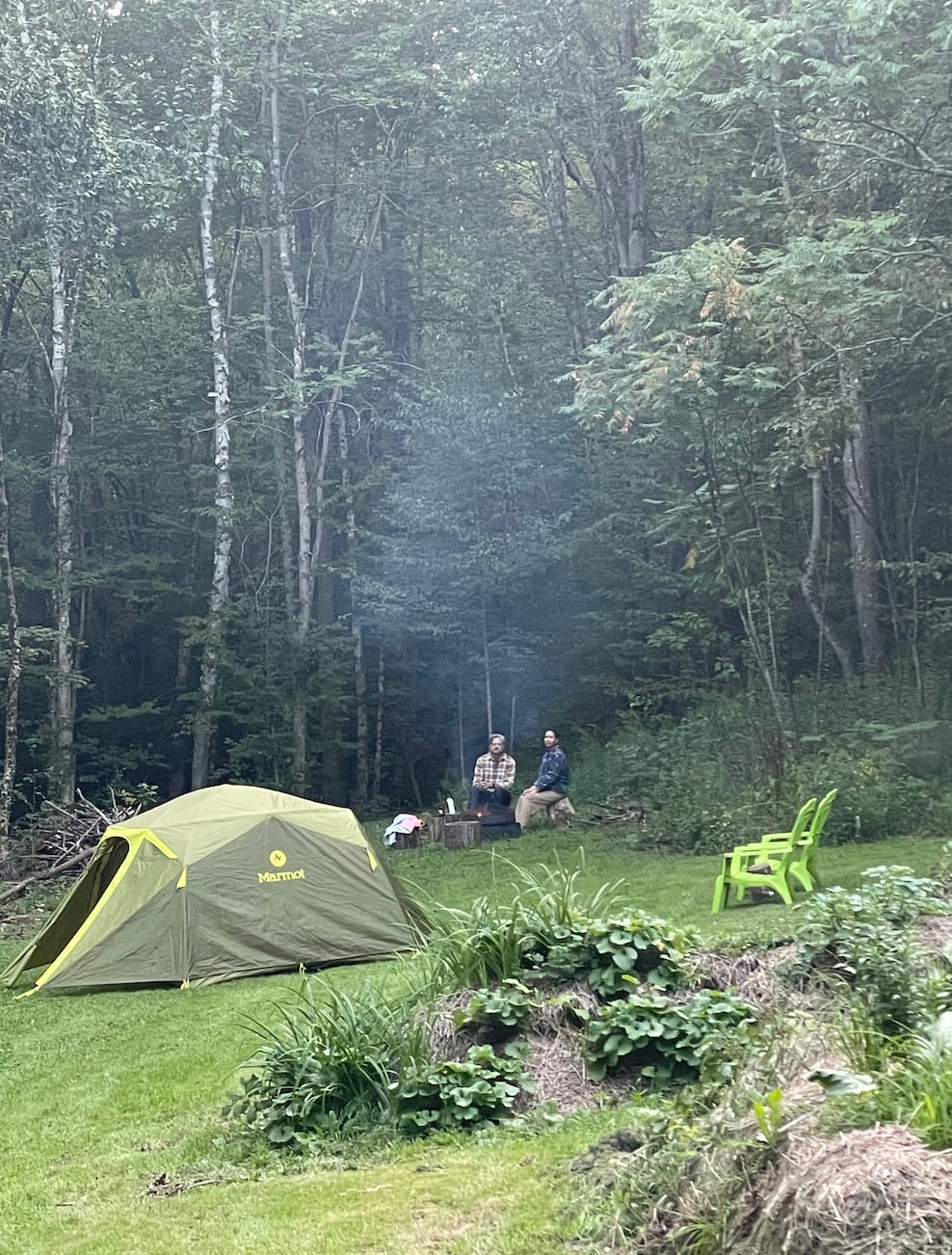 Tent seen here on the edge of manicured lawn. Option to put it here or out deeper in the forest under trees.