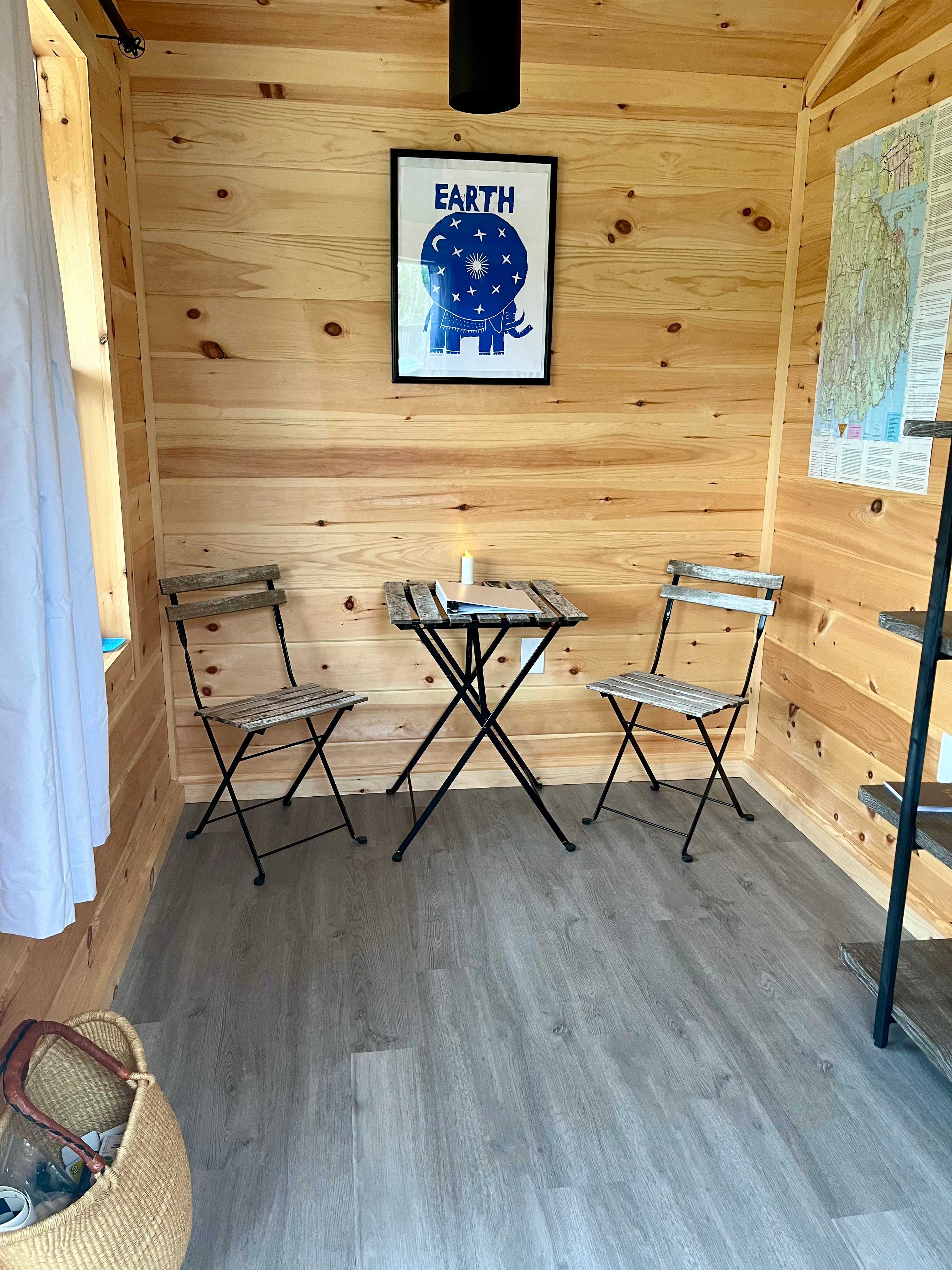 Indoor dining area with a basket full of games.
