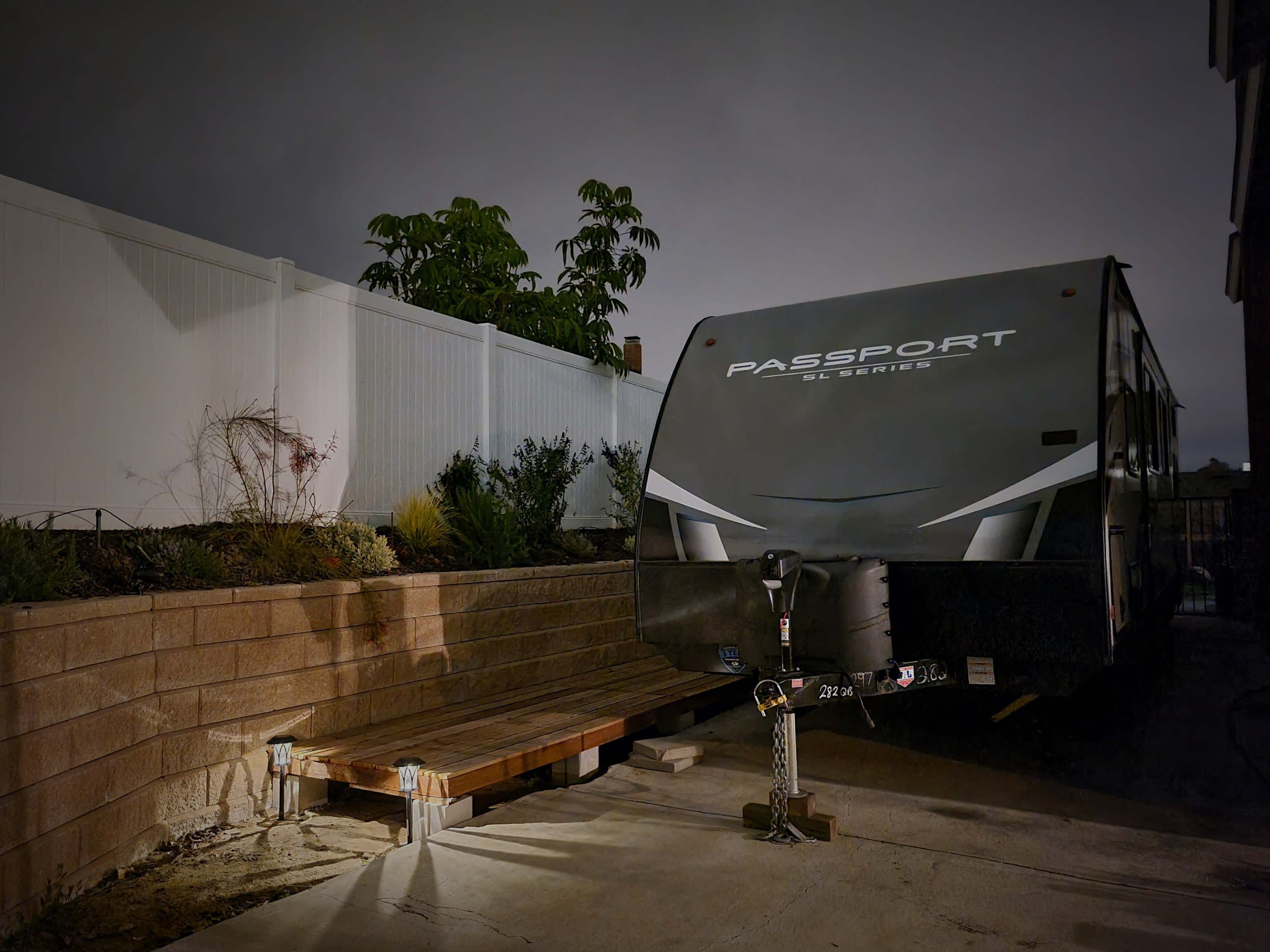 Trailer at late dusk with lightin