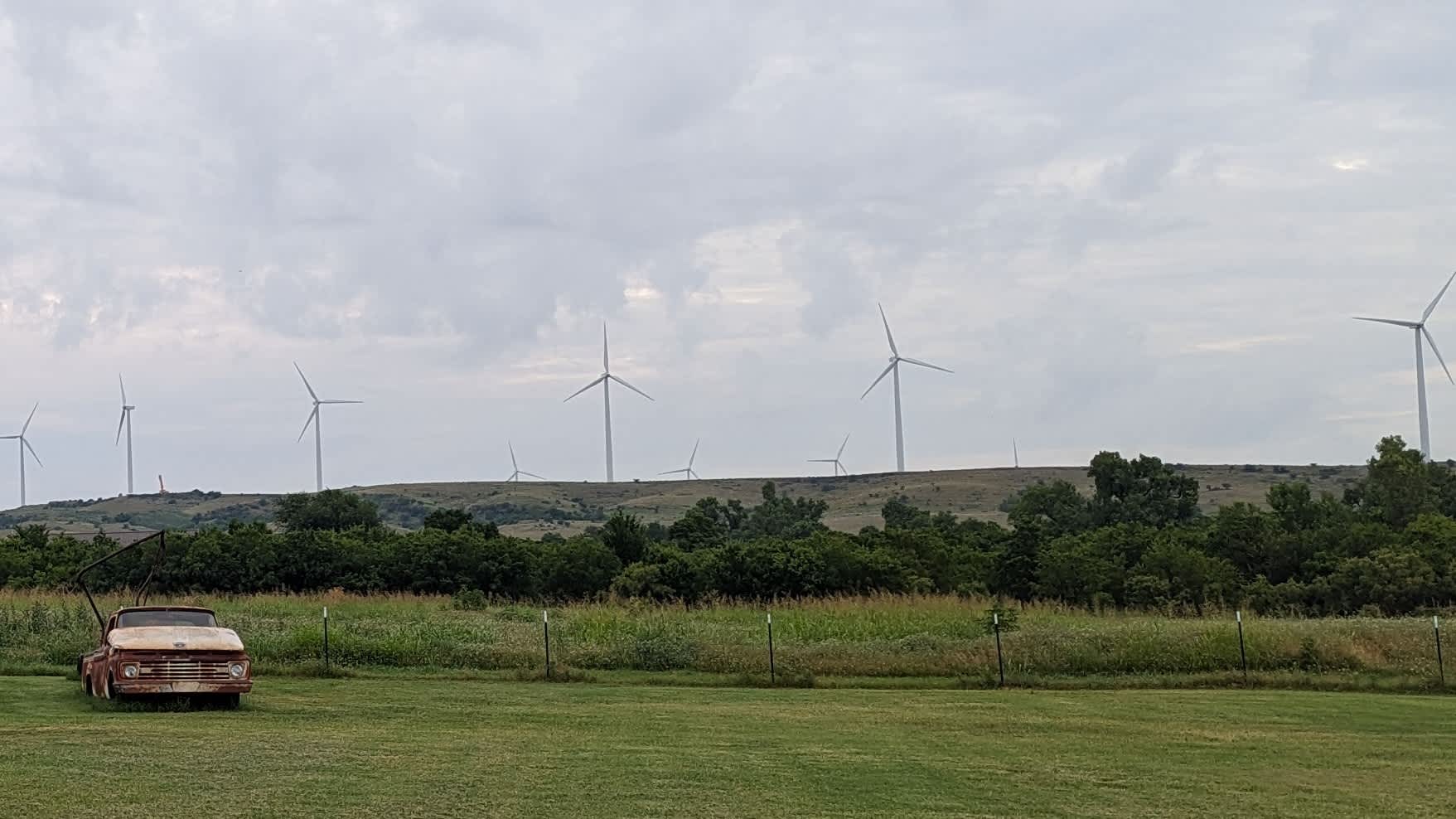 Wind turbines as seen from the back of the lot.