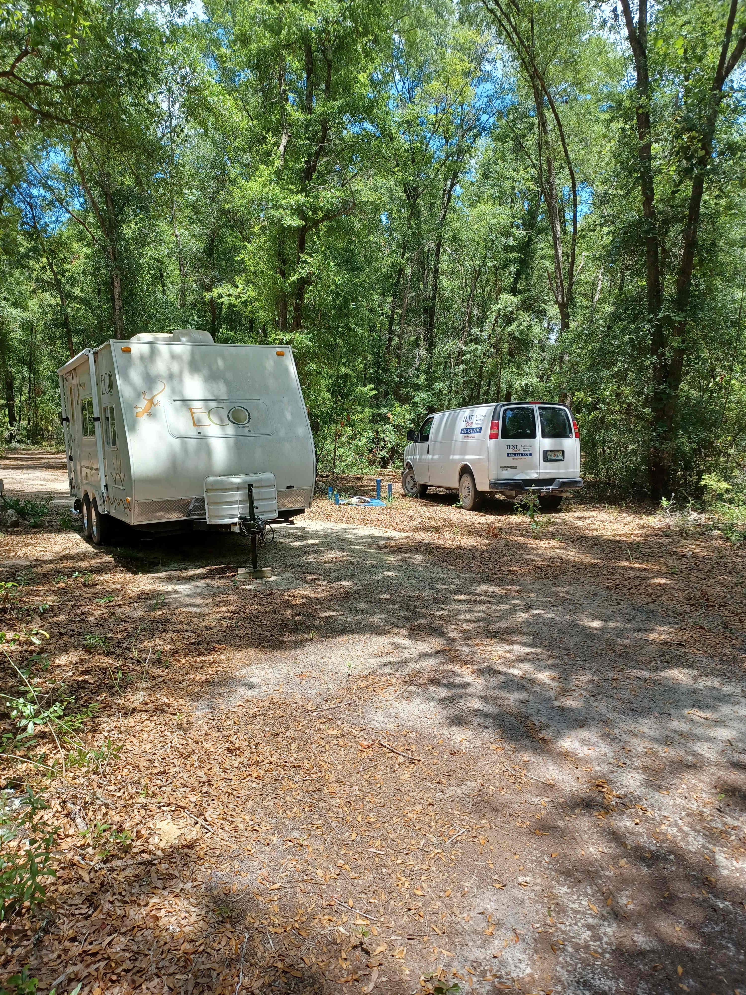 Plenty of room to unhook. Camper on one side, vehicle on the other.  Plenty of turn around space or pull-through exit.