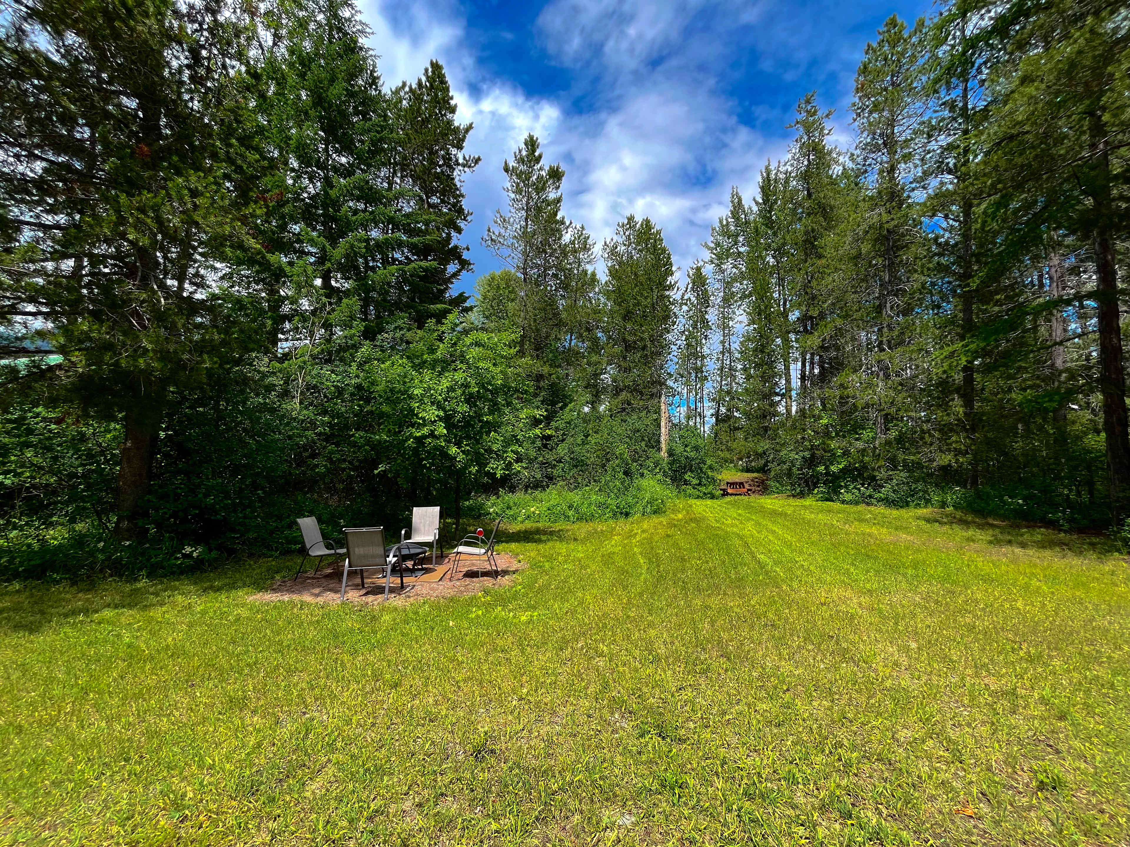 Current photo of site. Can fit any size camper. Fire pit available as weather allows 
