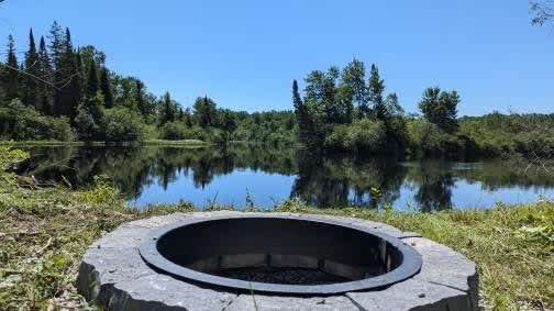 Sit at the large campfire on the edge of the Magnetawan river between the towns of Katrine, Ontario and Burks Falls, Ontario.  About 20 minutes north of Huntsville, Ontario and Muskoka.  