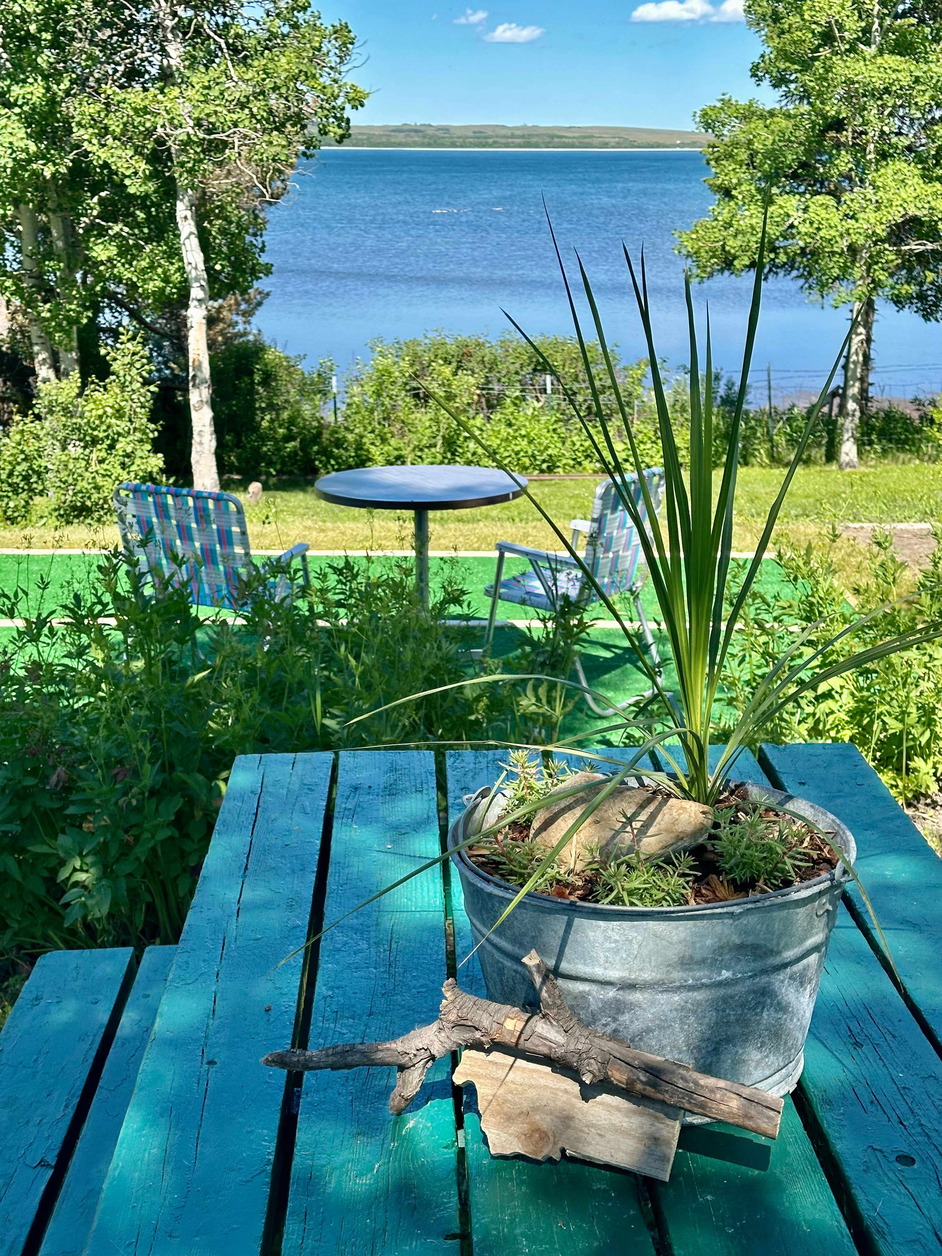 Enjoy a lake view from the picnic table or the “patio”.