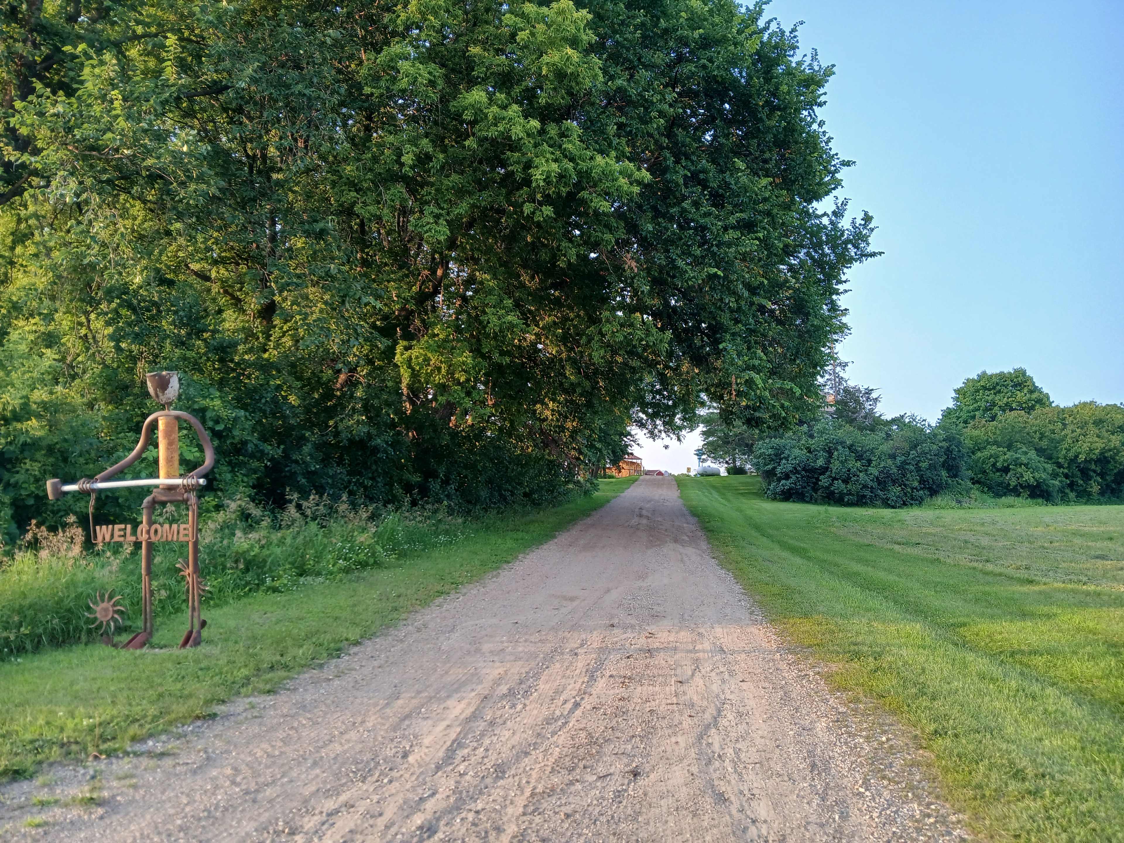 Welcome sign at the end of our driveway. 
Watch the fire number our gps dot is farther north than we are.