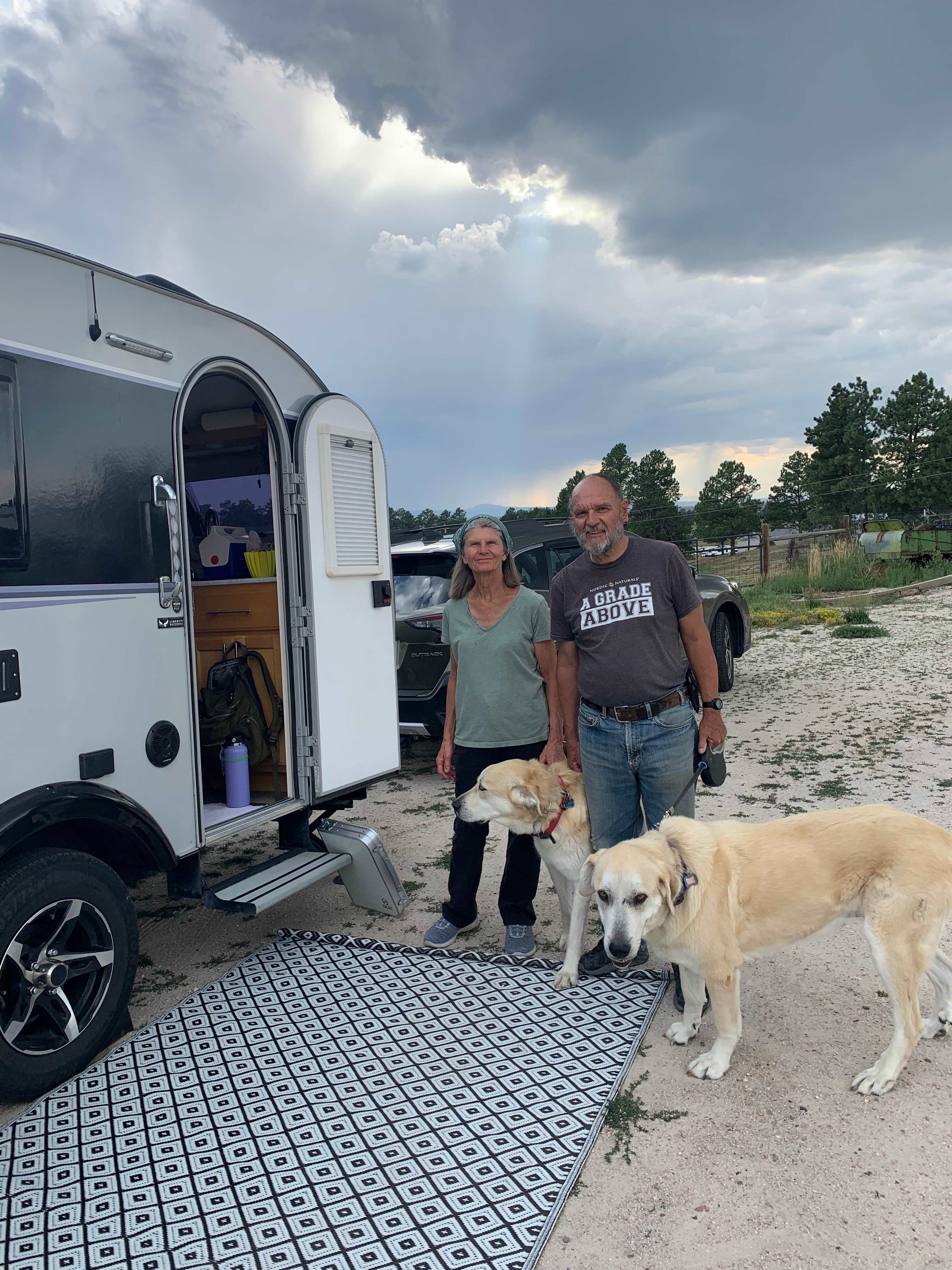 Tom & Diane with their beautiful sweet pups-leashed for preventing rabbit chases and neighbor visiting. 