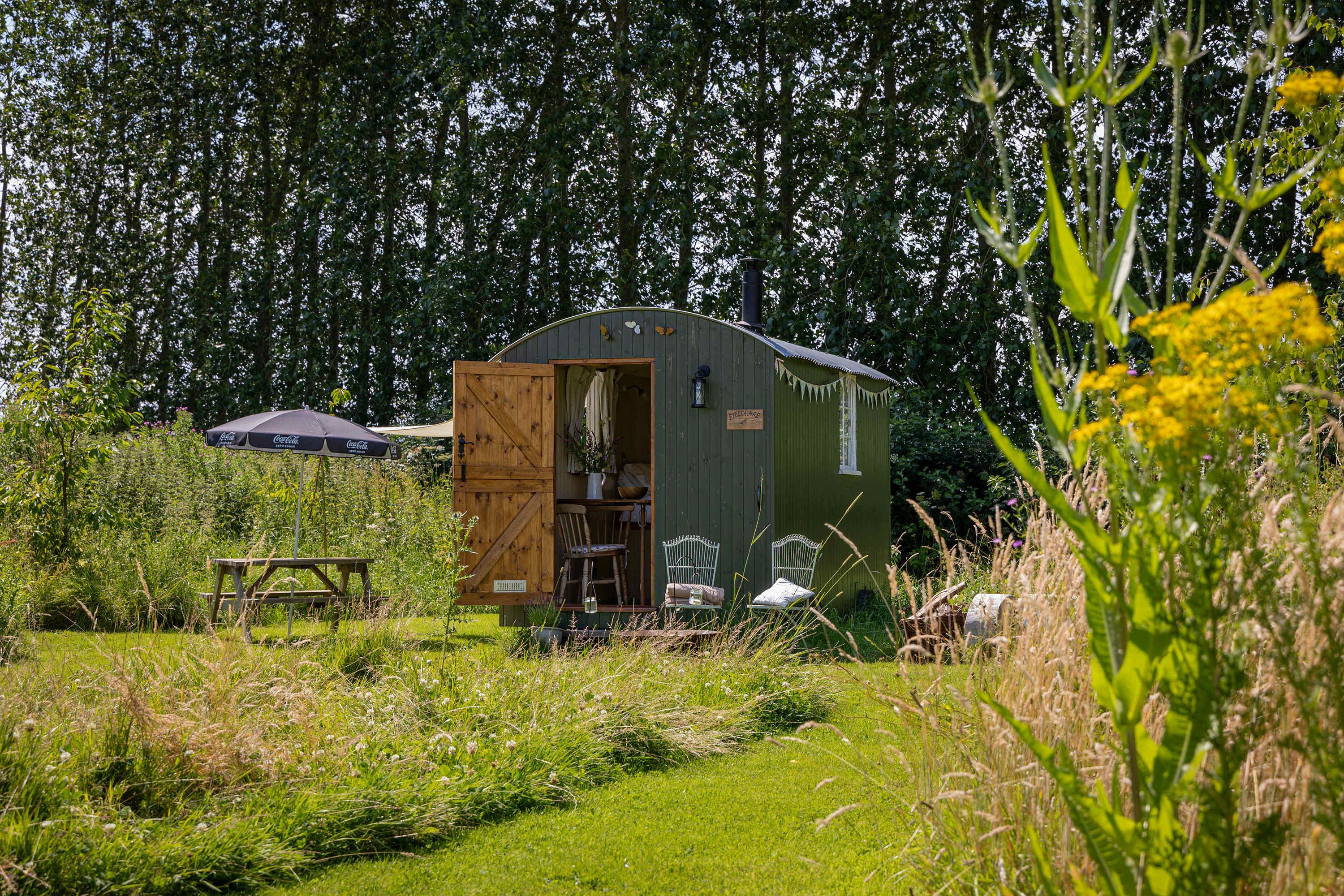A cute shepard's hut is the perfect getaway for solo campers or couples, no matter what the weather.