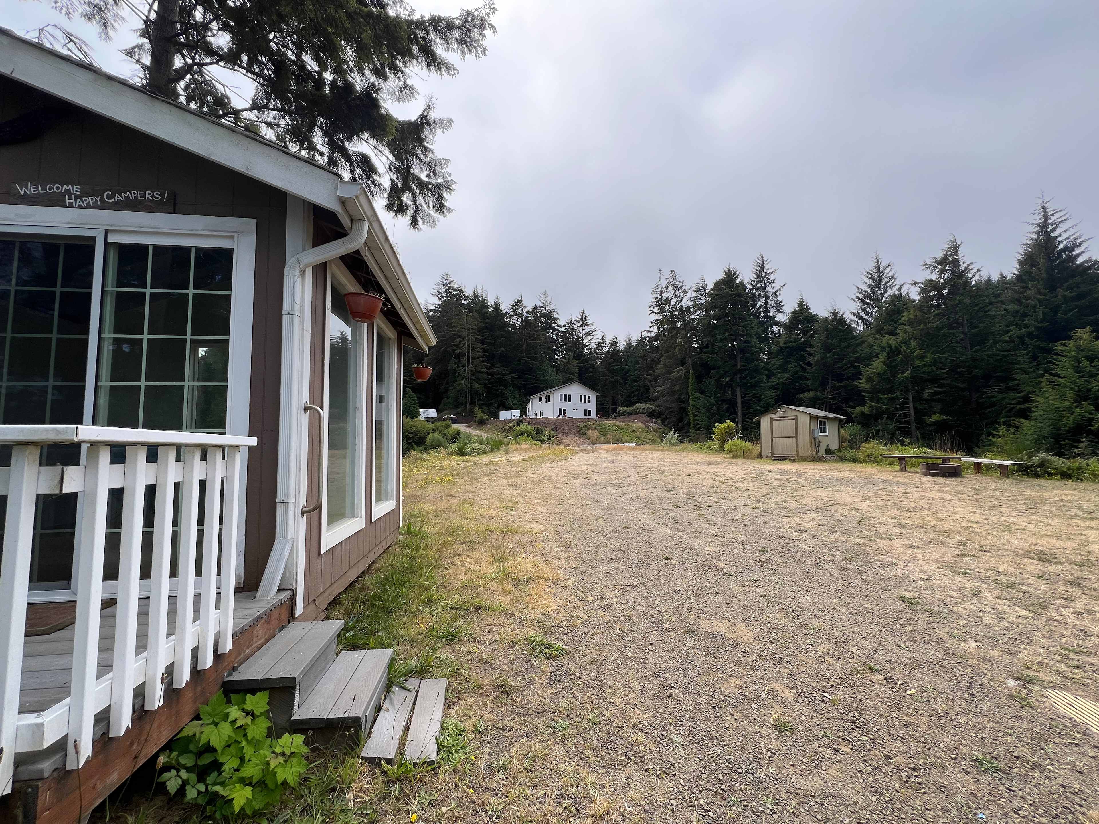 Neighboring property above the campsite built a new house.