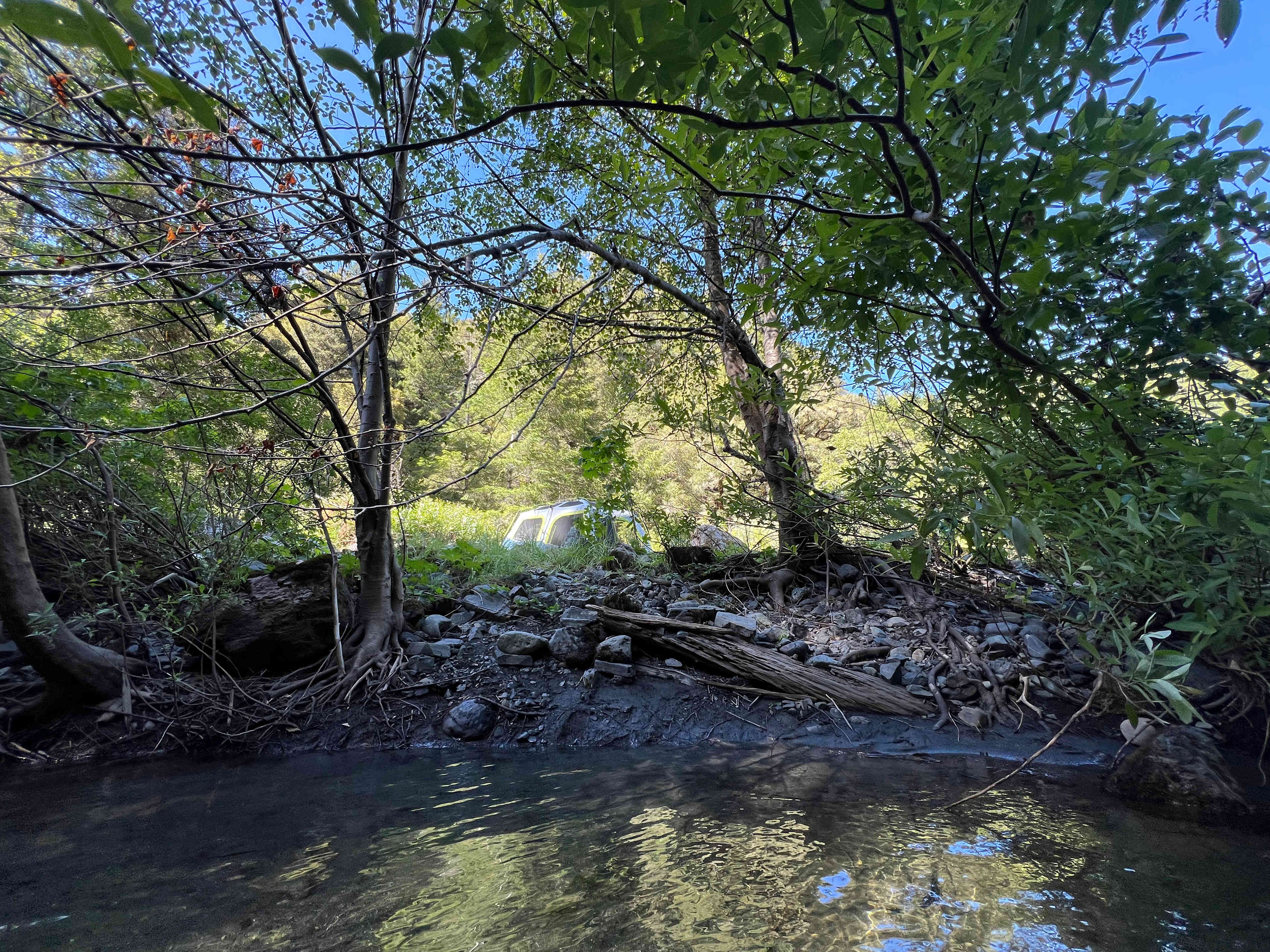 Tranquil Riverside Camping