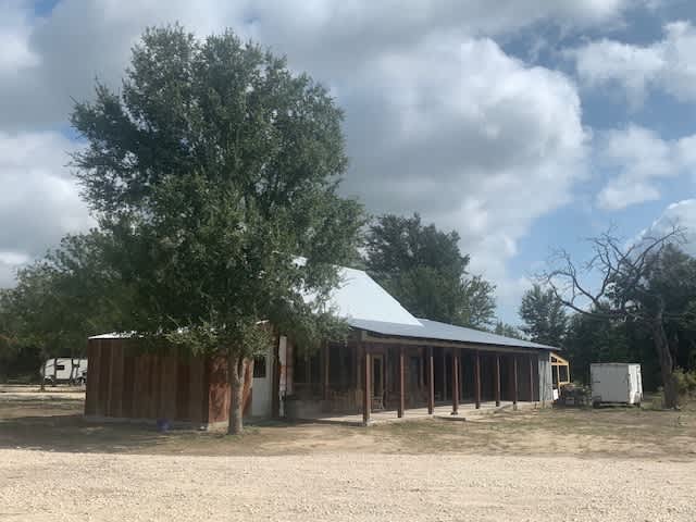 Park office. Beautifully rustic gathering space, coffee center and kitchen facilities on one end and bathrooms, showers and laundry far end