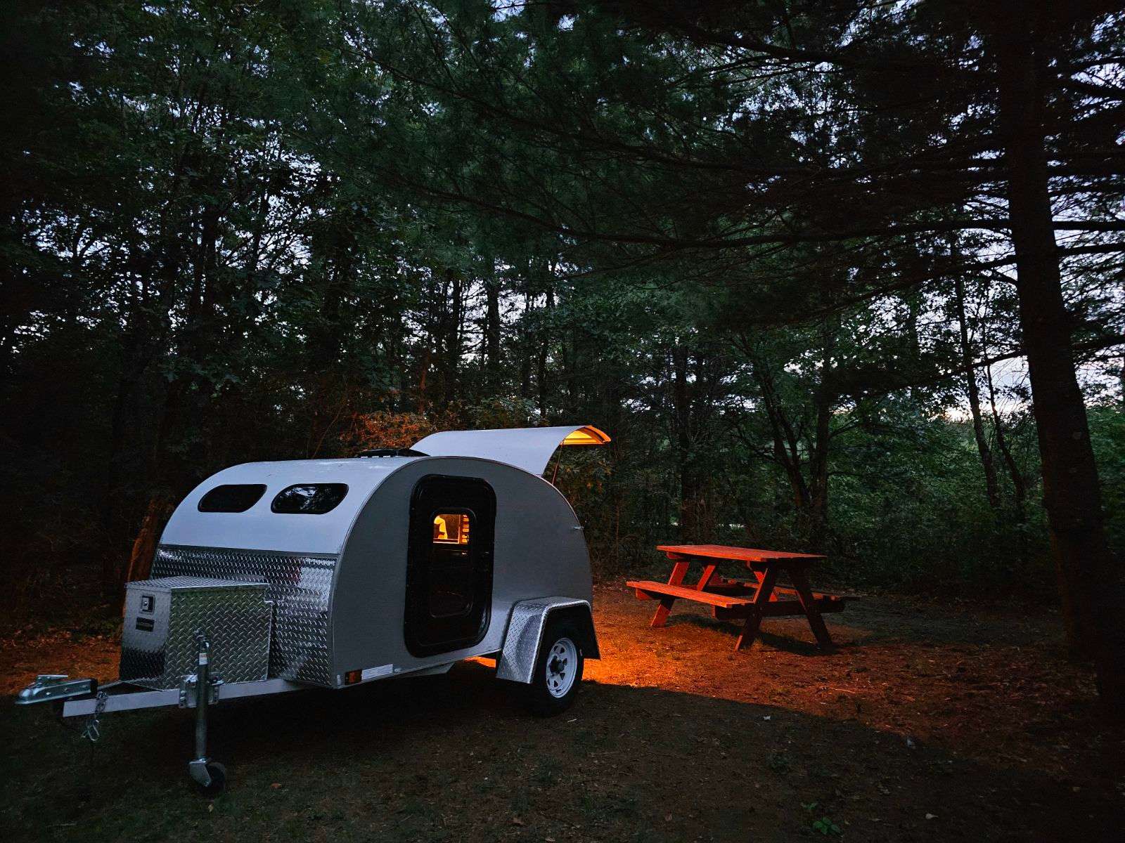 Teardrop camping in campsite #1 at night 