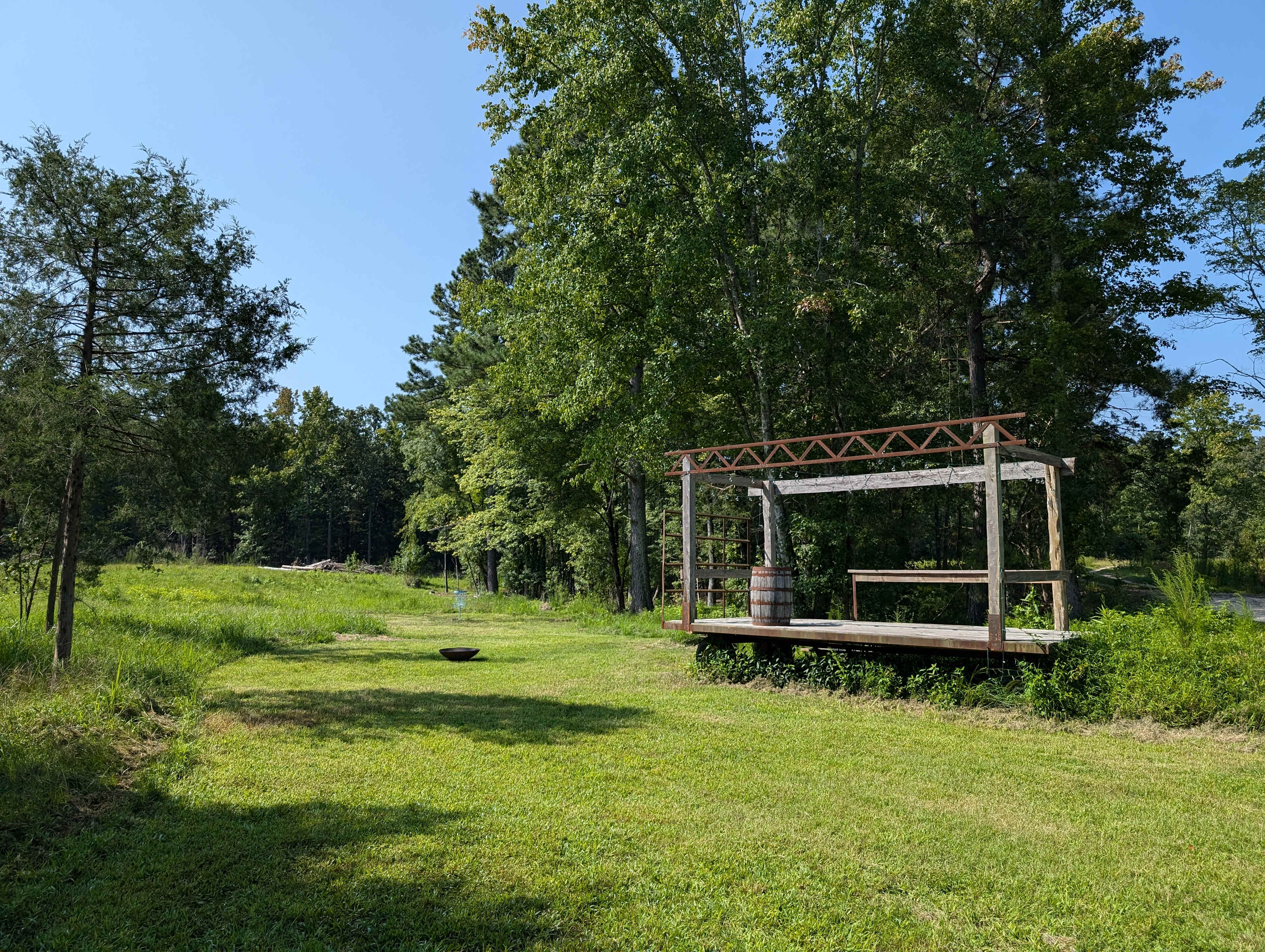 This is the campsite by the Pond/Stage. When driving in, you'll turn right down towards the pond. Pull off to the left in front of the stage before crossing the dam. Campsite is in front and to the left of the stage.