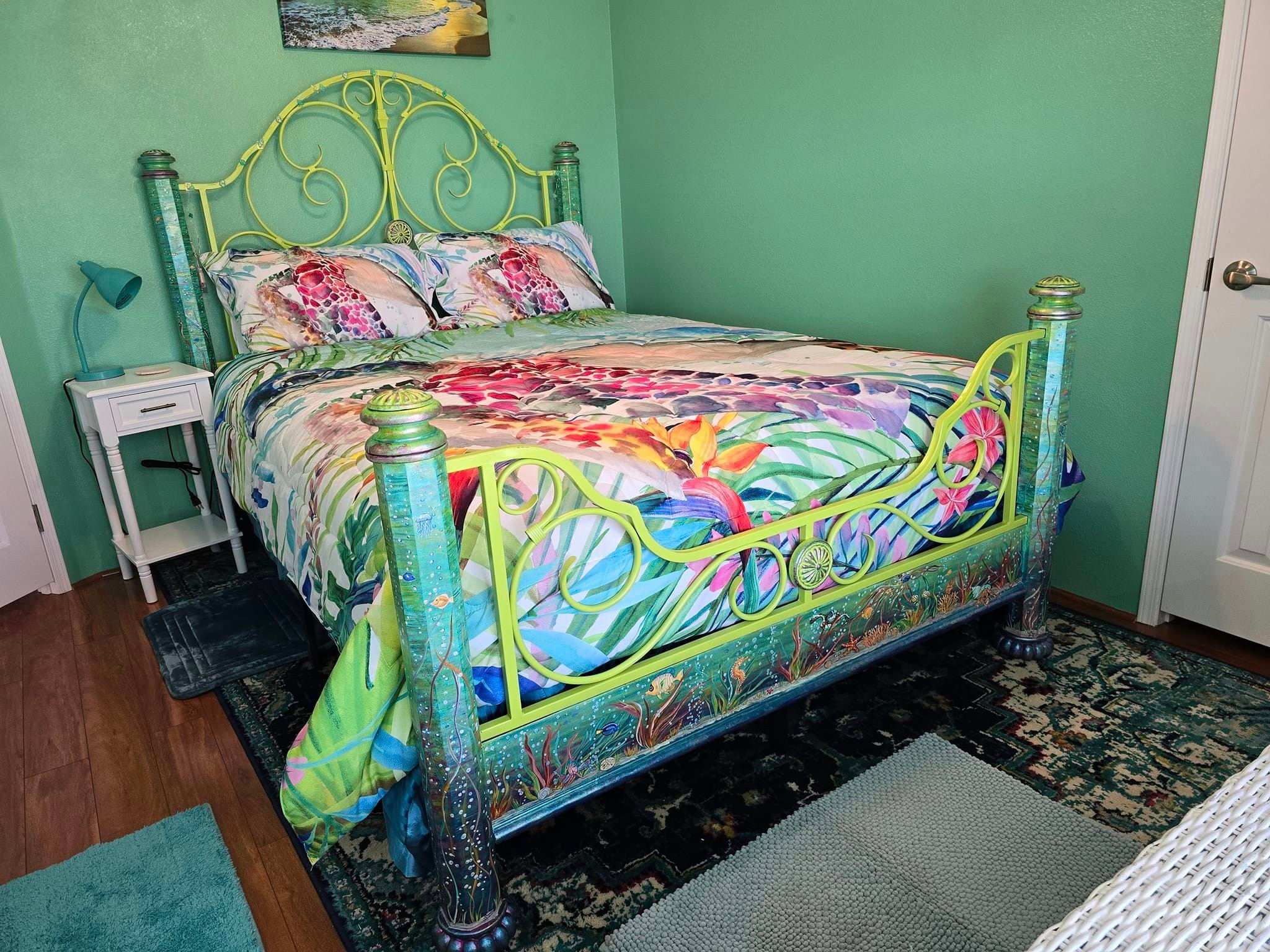 Tropical Guest Room. Queen size bed, but it's tight along the wall side, if 2 will be using this room. It's better for one person. 