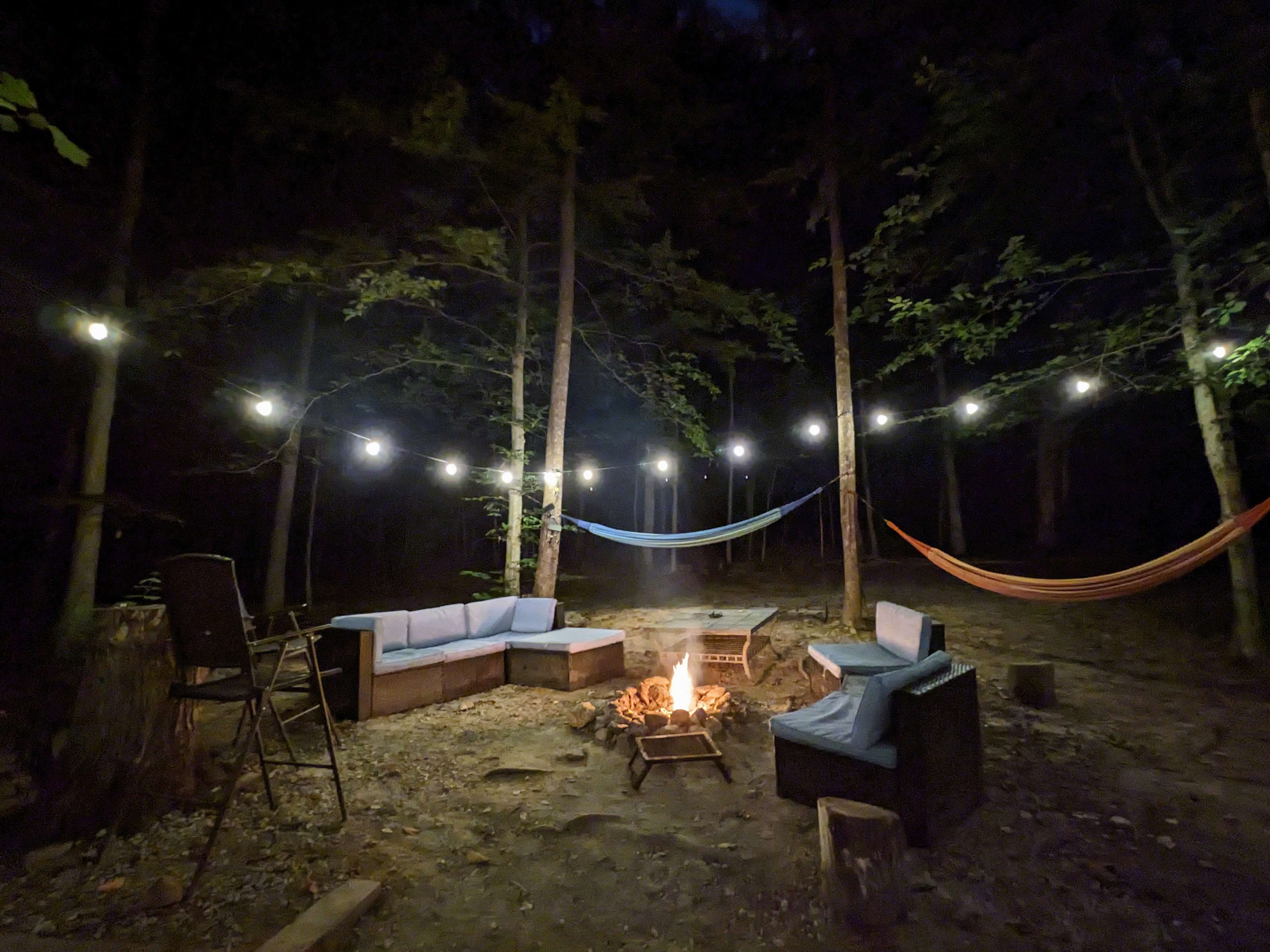 Enjoy comfortable seating, string lights, a propane grill, hammocks, and much more!