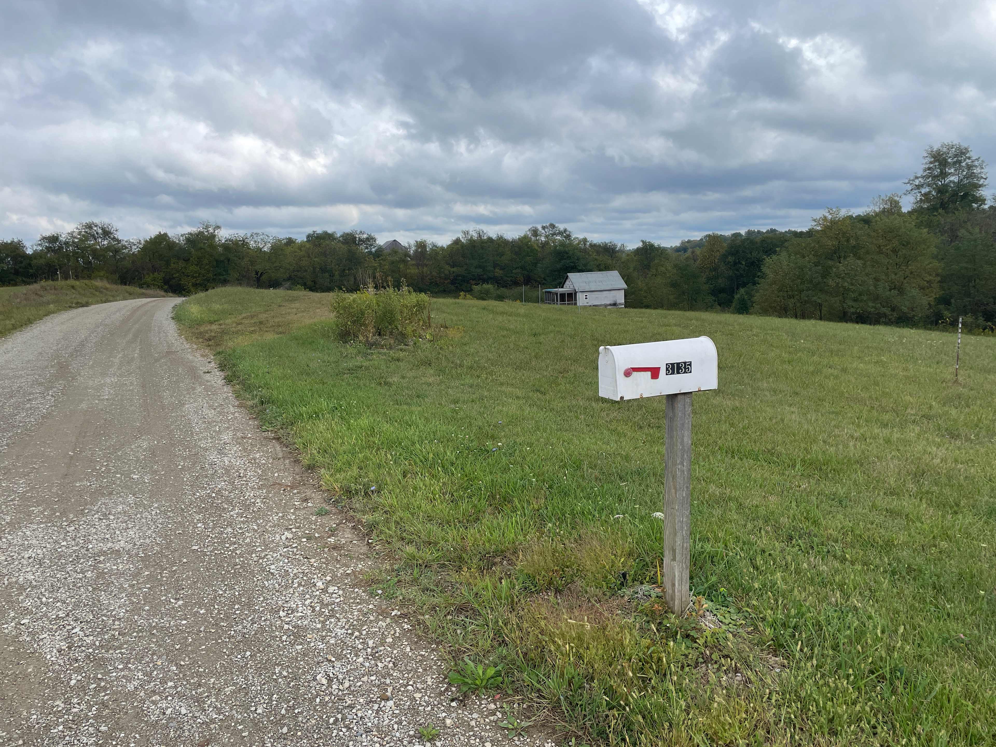 Pull your camper off the road on the gravel and grassy drive.  It is easy  to level your rig here.  Or park your car and set up your tent camp on the 