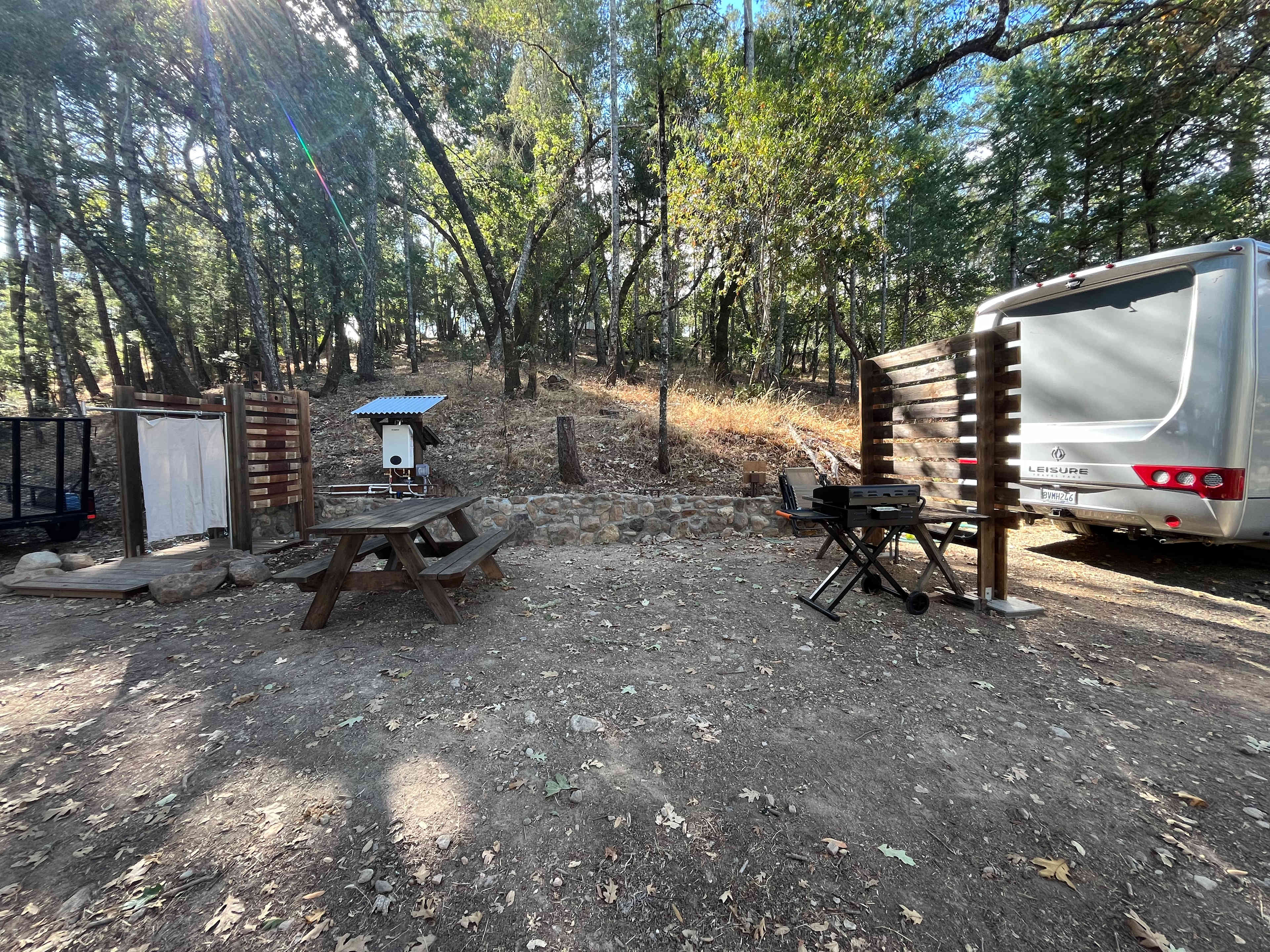The camp. Shower, picnic table, Propane, BBQ/griddle, RV parking.
