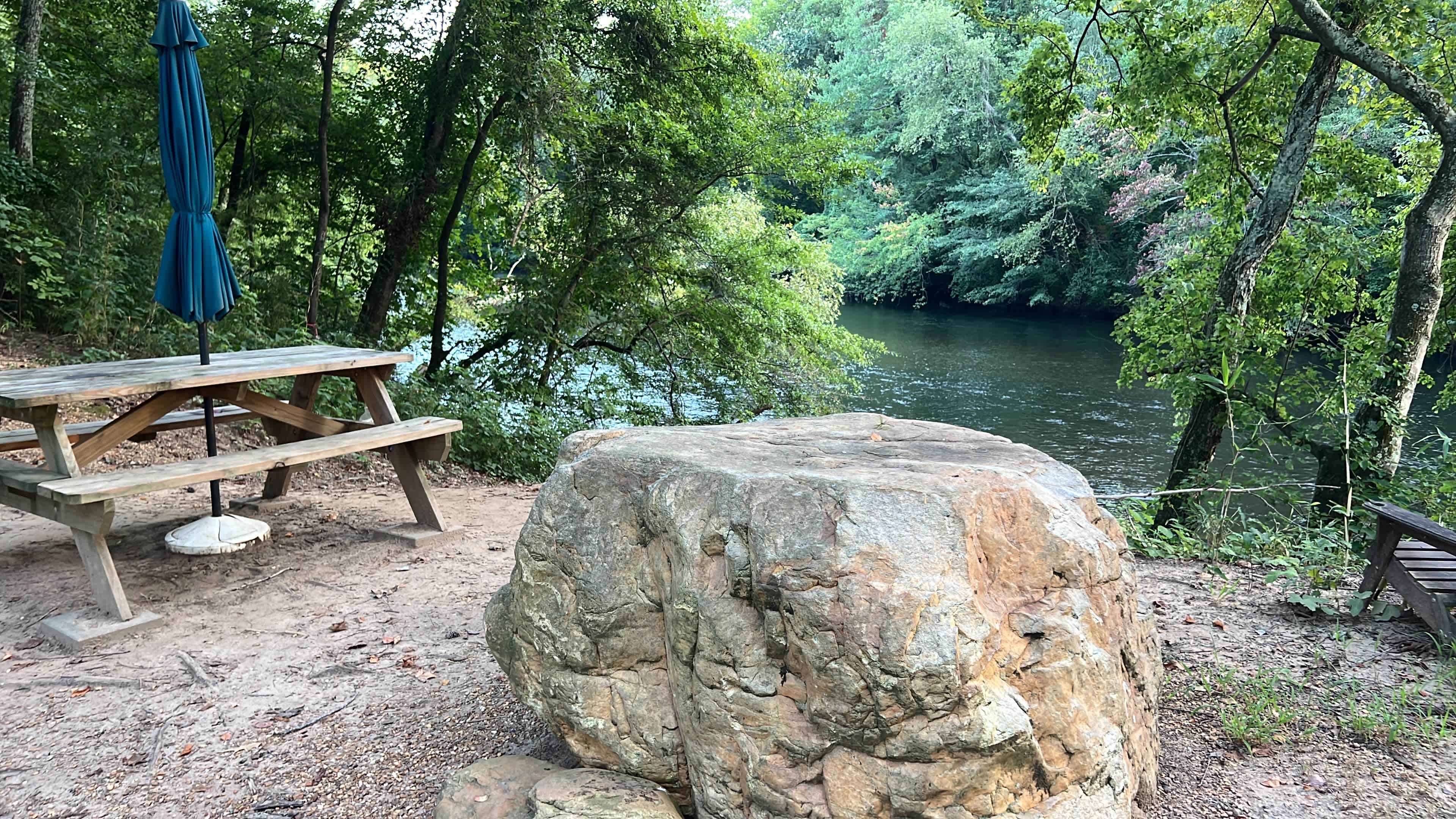 Large flat top boulder next to campsite.