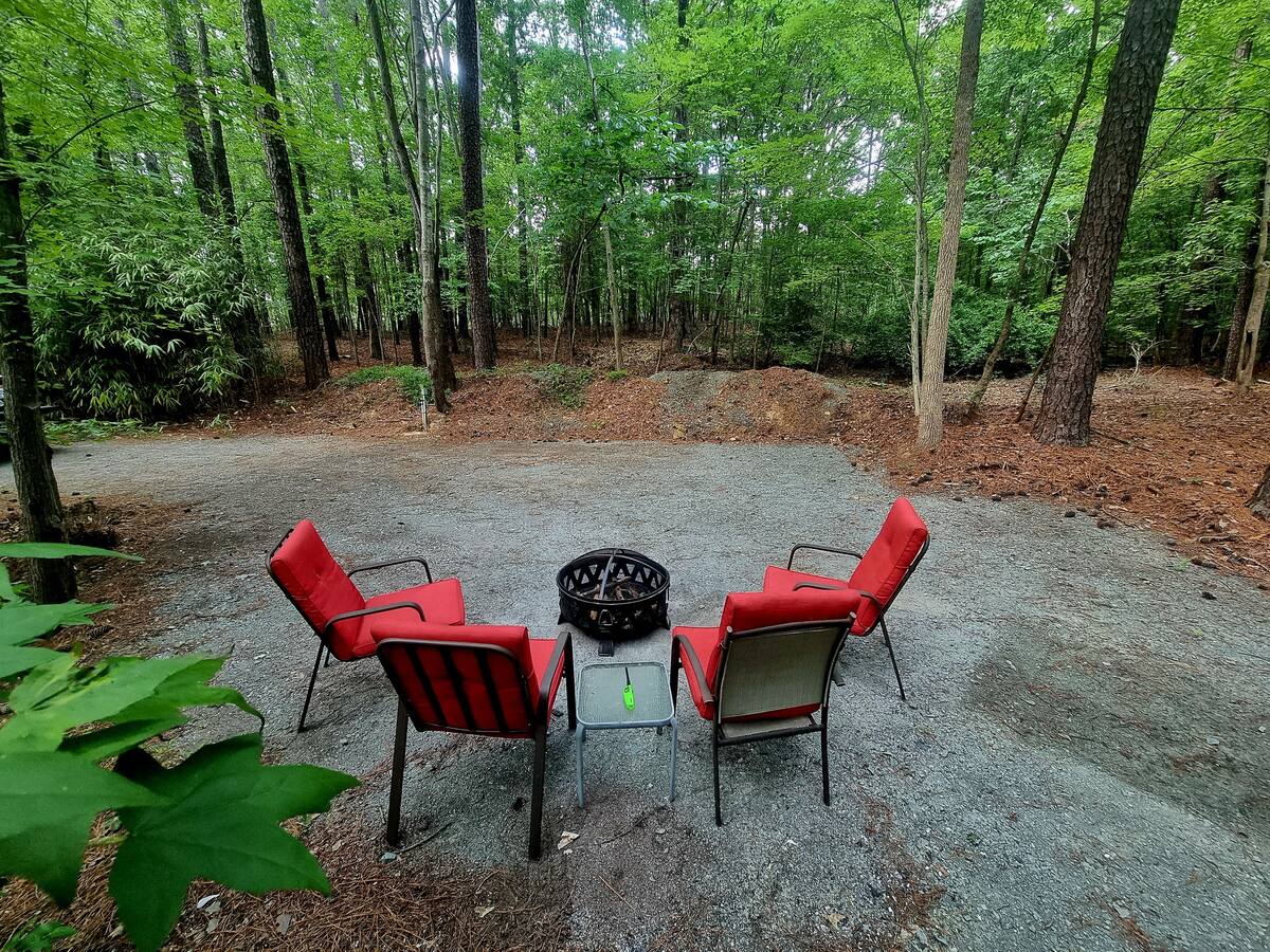 Wooded RV spot with campfire