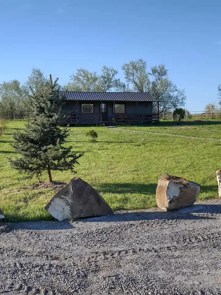 Wolf Haven Cabins has 2 cabins on 2 acres of property that is completely dog fenced.  This cabin is called the Howling Wolf Cabin.
