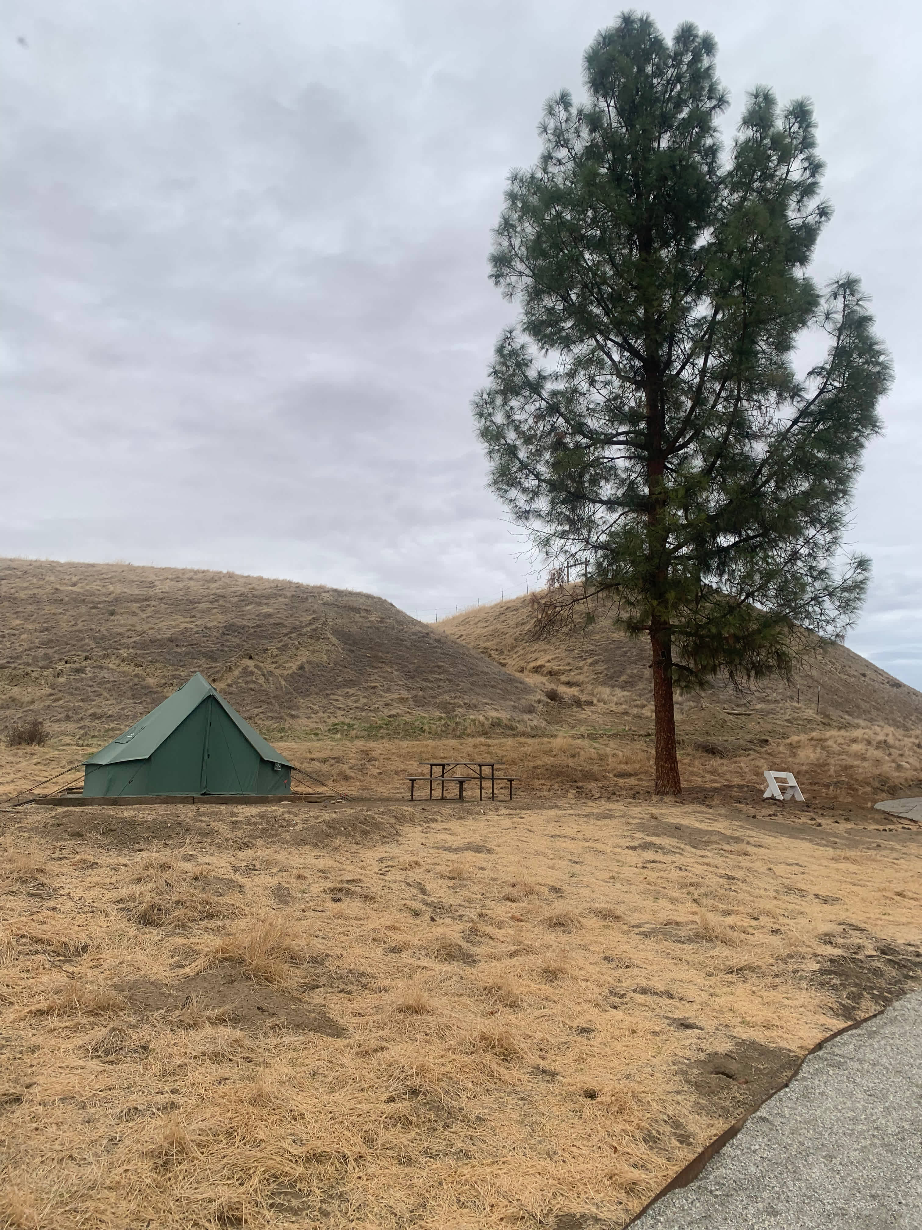 This Glampsite is situated by a Jeffery Pine at the far east side of the property. Zip open the flaps and enjoy the river view. In addition to the 14 acres at Okihi, this site boarders 20 MORE county owned acres you can go explore.