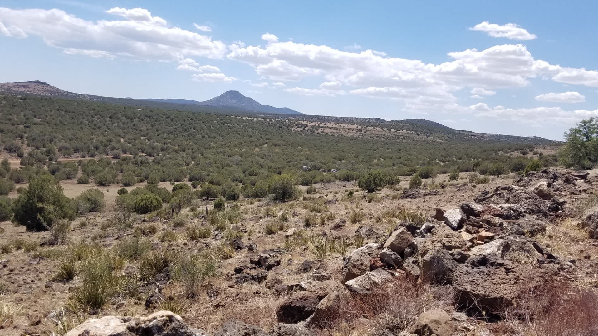 Picacho Butte in background elev. 7,168. 
approx. 6 miles away. 
Peakbagger.com info. 
https://www.peakbagger.com/peak.aspx?pid=3934