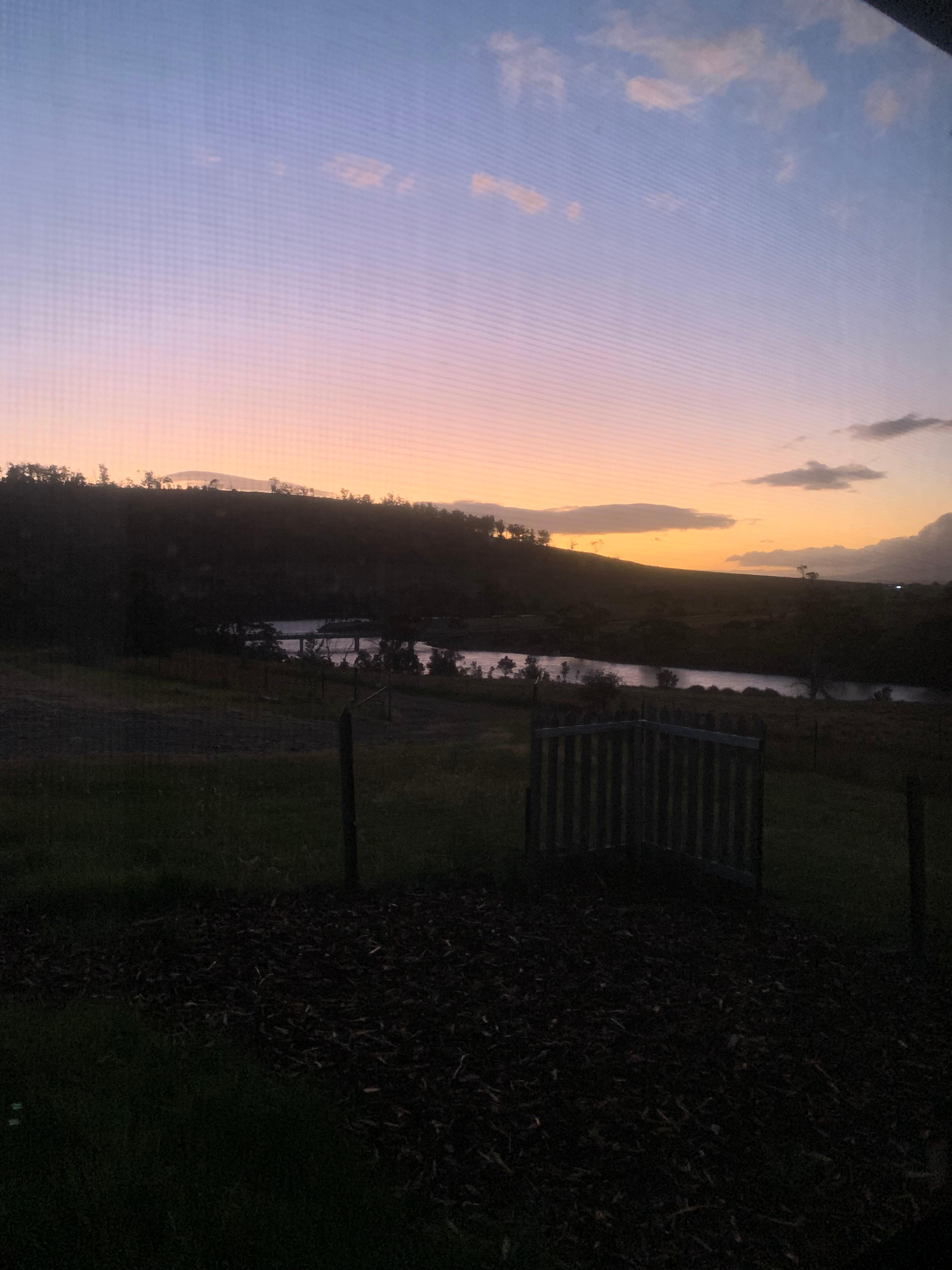 View from cabin window at sunset