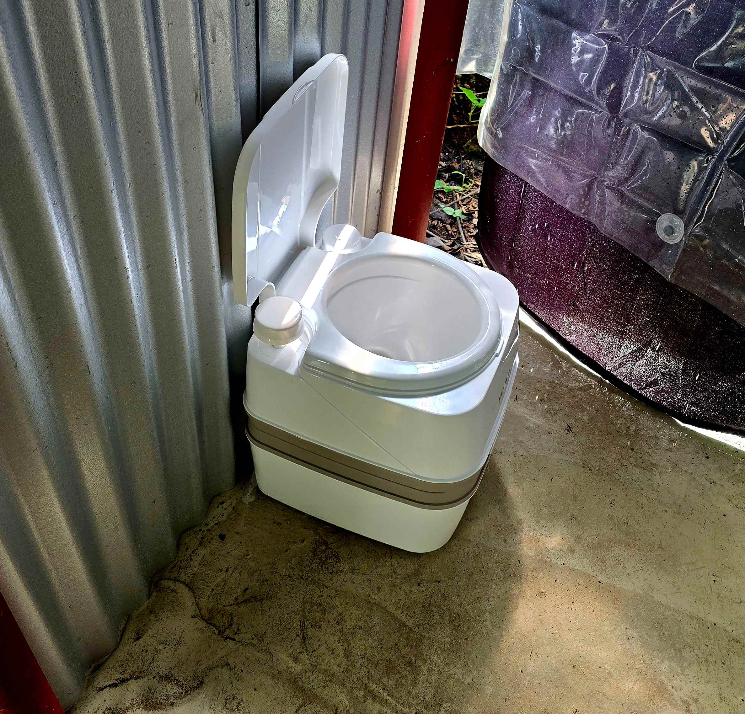 Portable, flushing toilet available for rent.  McD's and BKing in town 5 minutes away, if you'd rather.  Or bring your own set up.