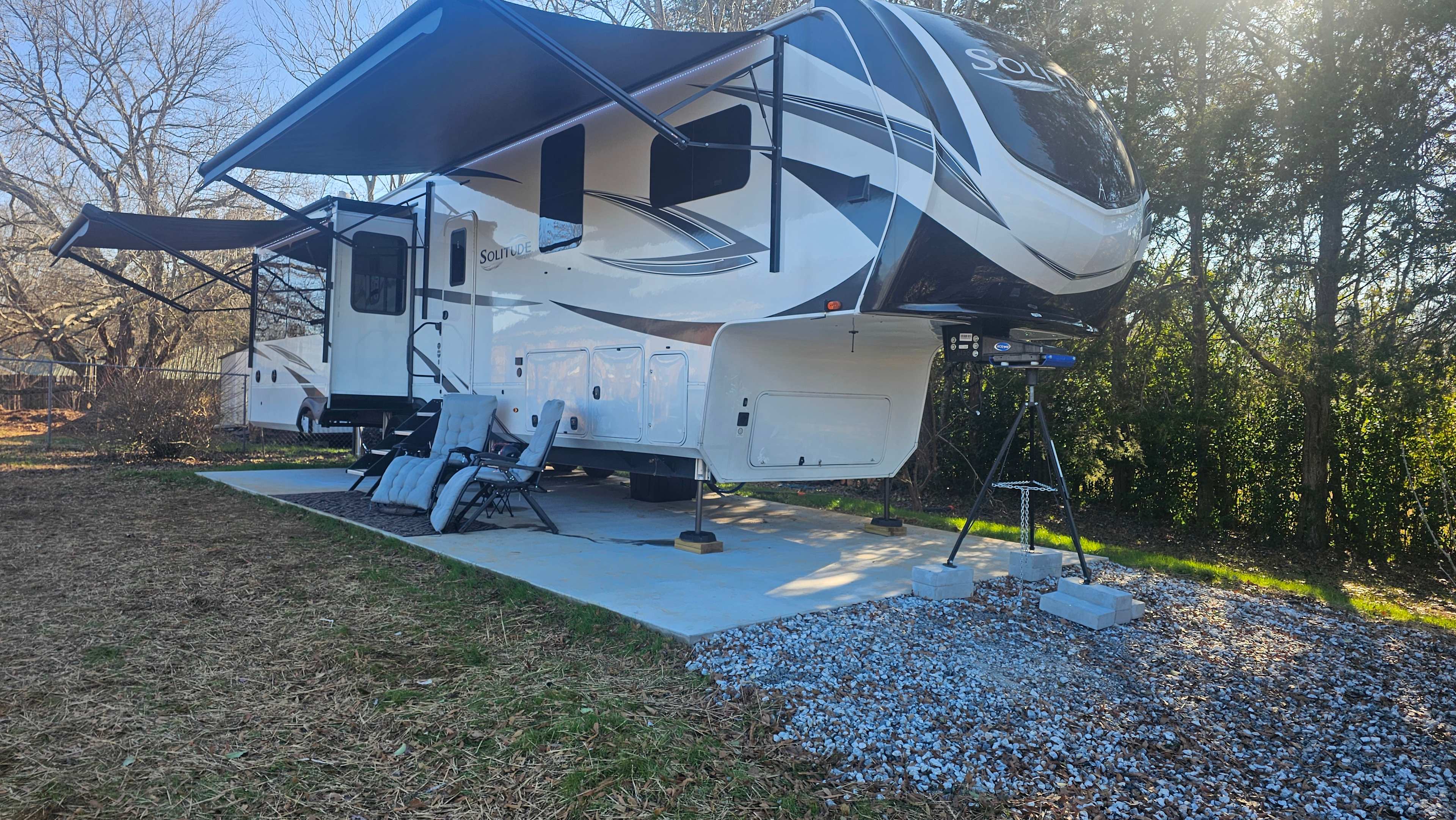 Level Concrete pad large enough to accommodate 45ft rig.  
