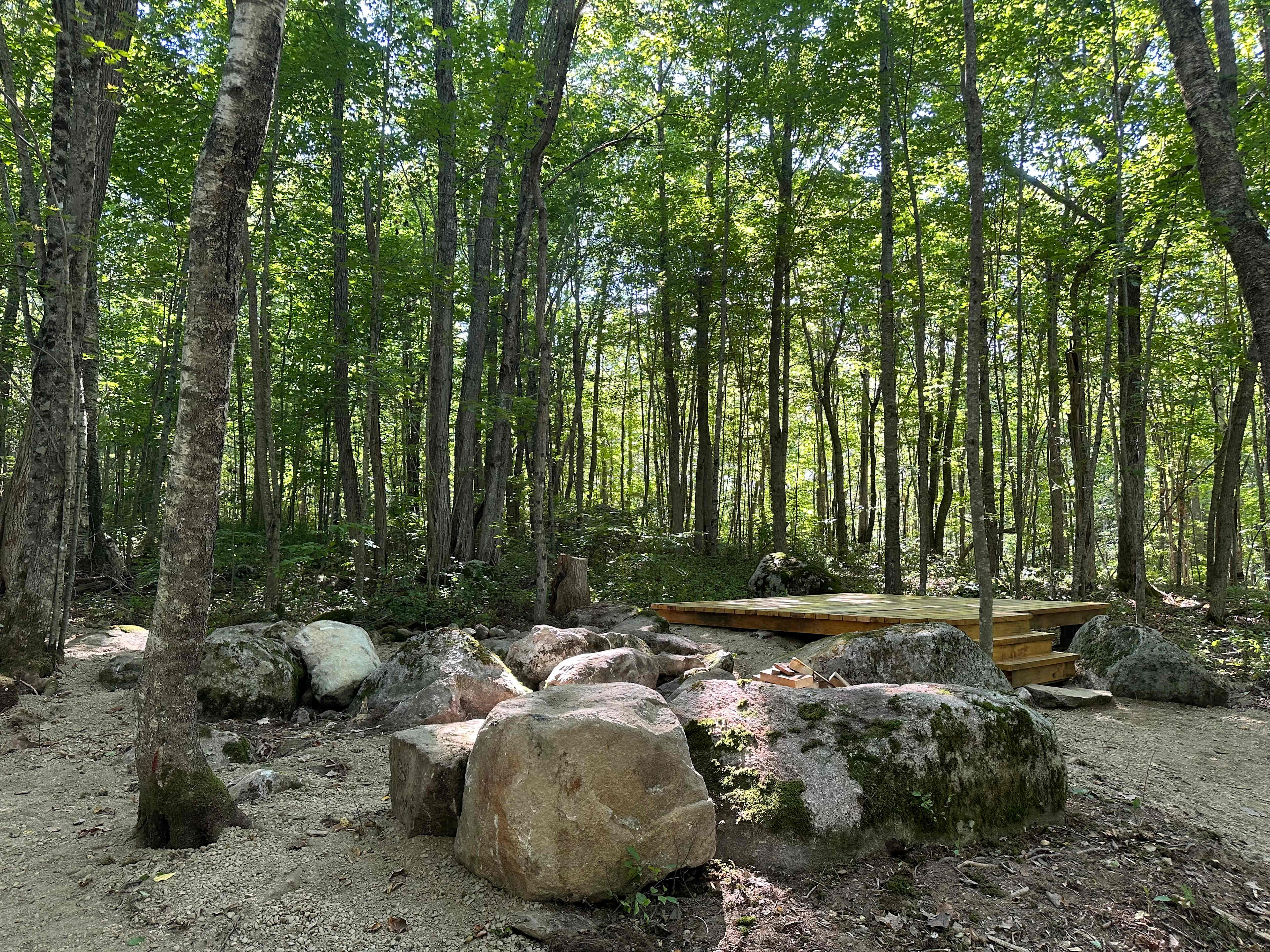 Featuring a natural boulder fire pit and a 12’x12’ platform, this private tent site will be the perfect setting for your get away. 
