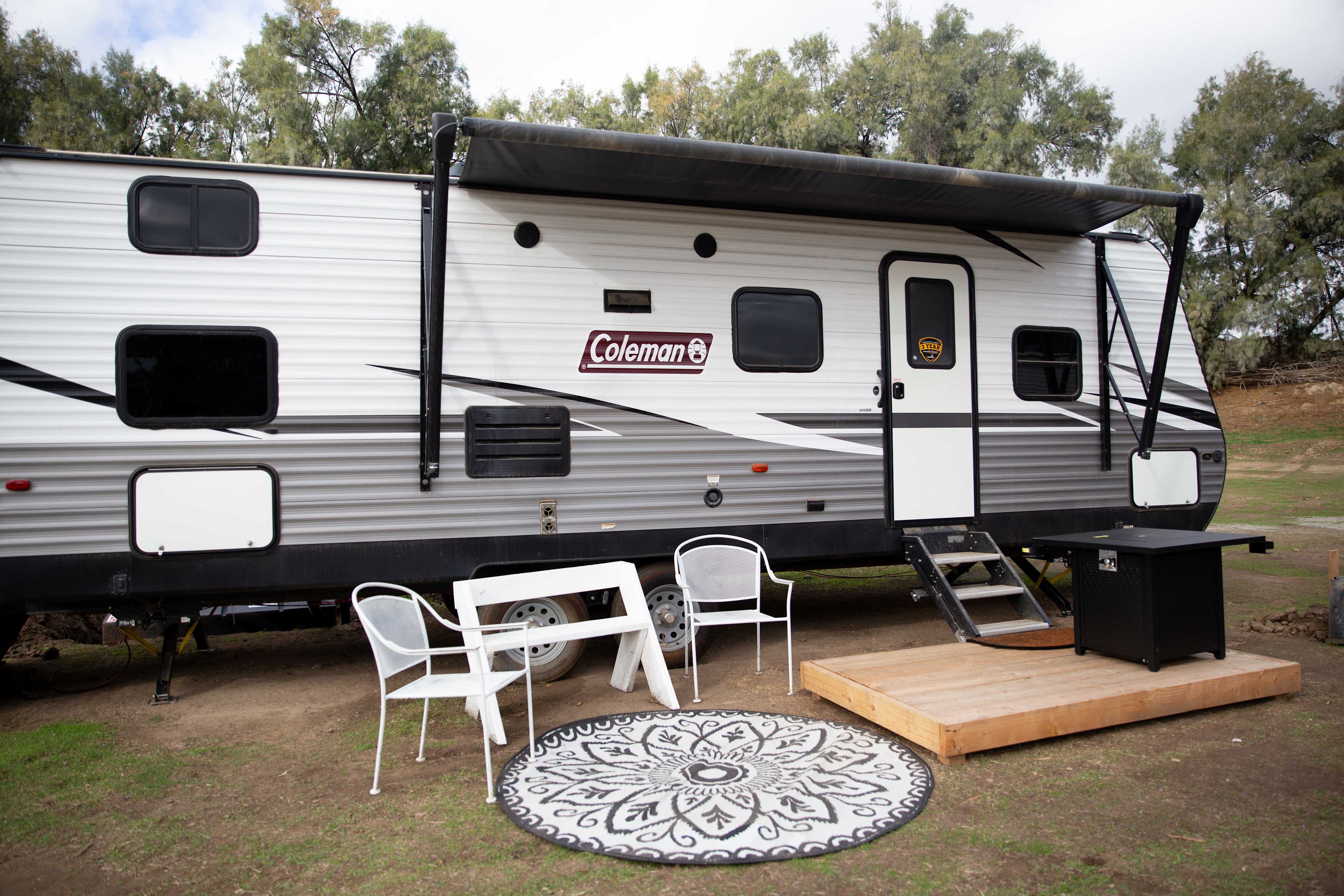 Riverside RV #2- This site has its own private propane click on fire pit, river views and close parking.