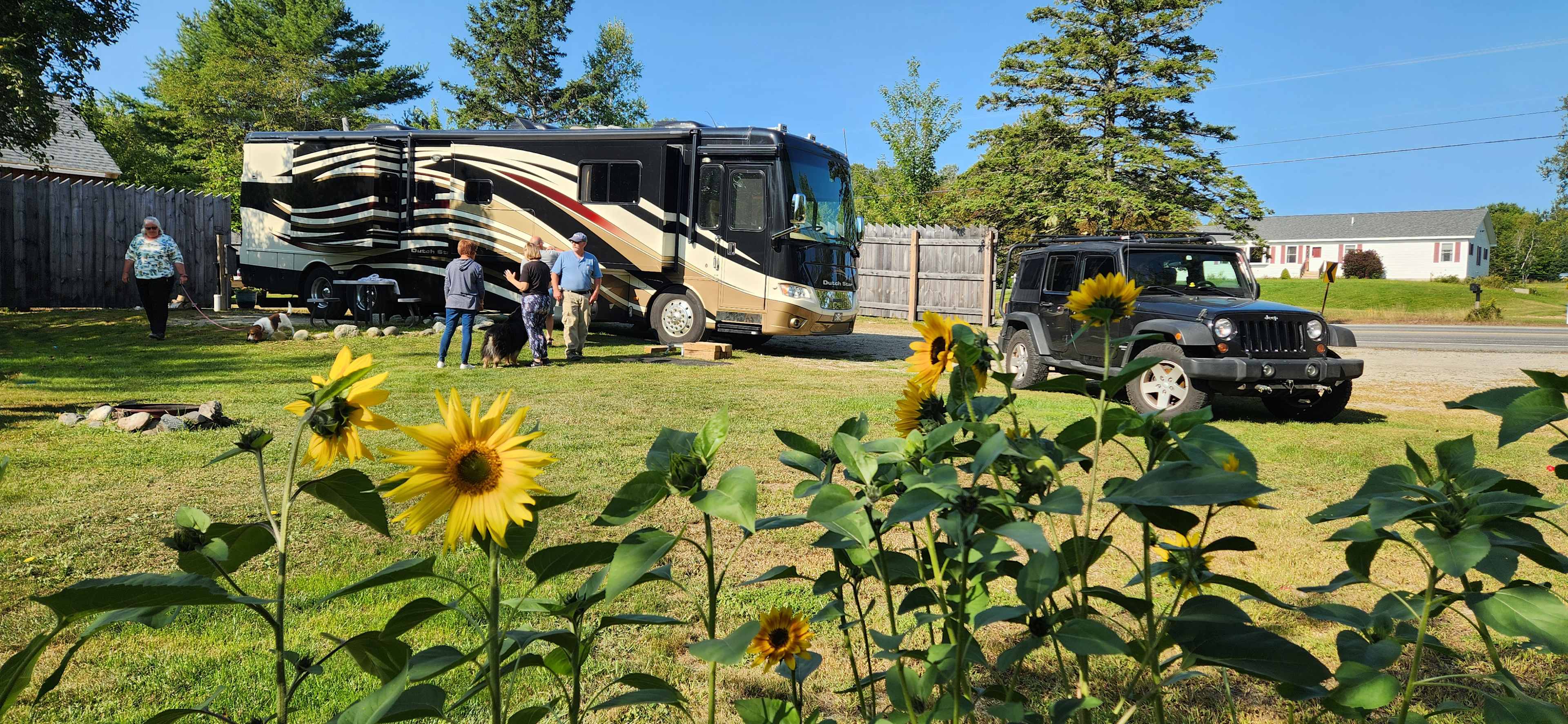 A motor coach sits on the pad at Ellie's RV spot.