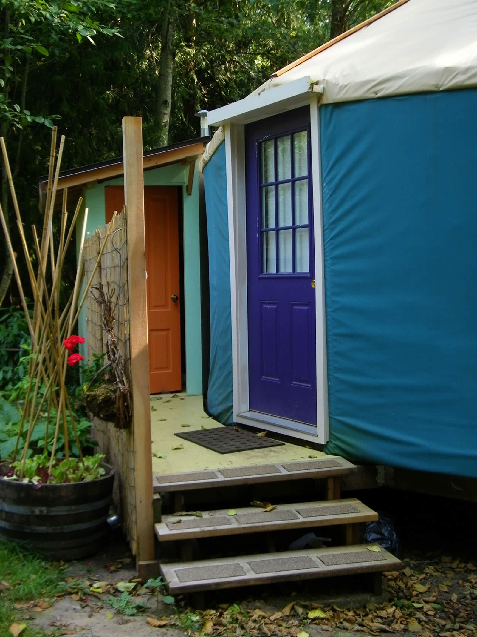Shower is in an attached enclosed room, accessible from the front deck.