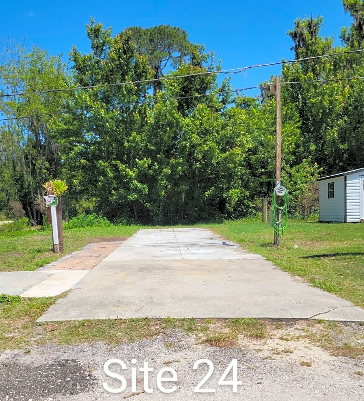 #24 30/50 Amp Full Hook Up Canal RV Site